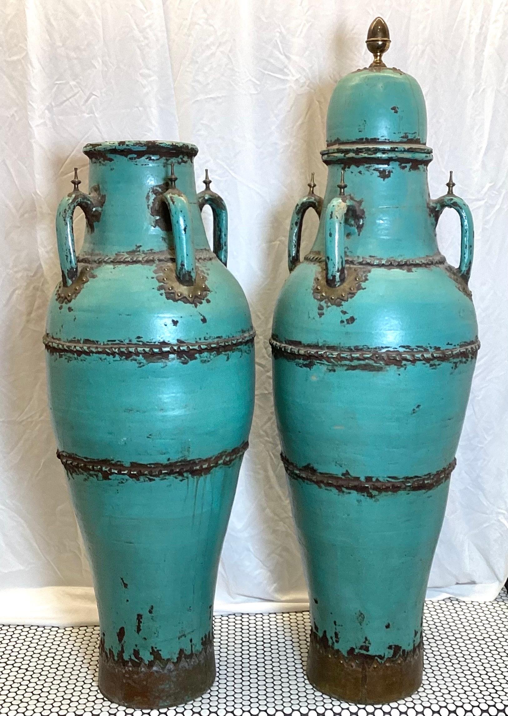 A Pair of Monumental Four Handled Tall Pottery Urns For Sale 4