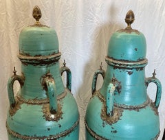 A Pair of Monumental Four Handled Tall Pottery Urns