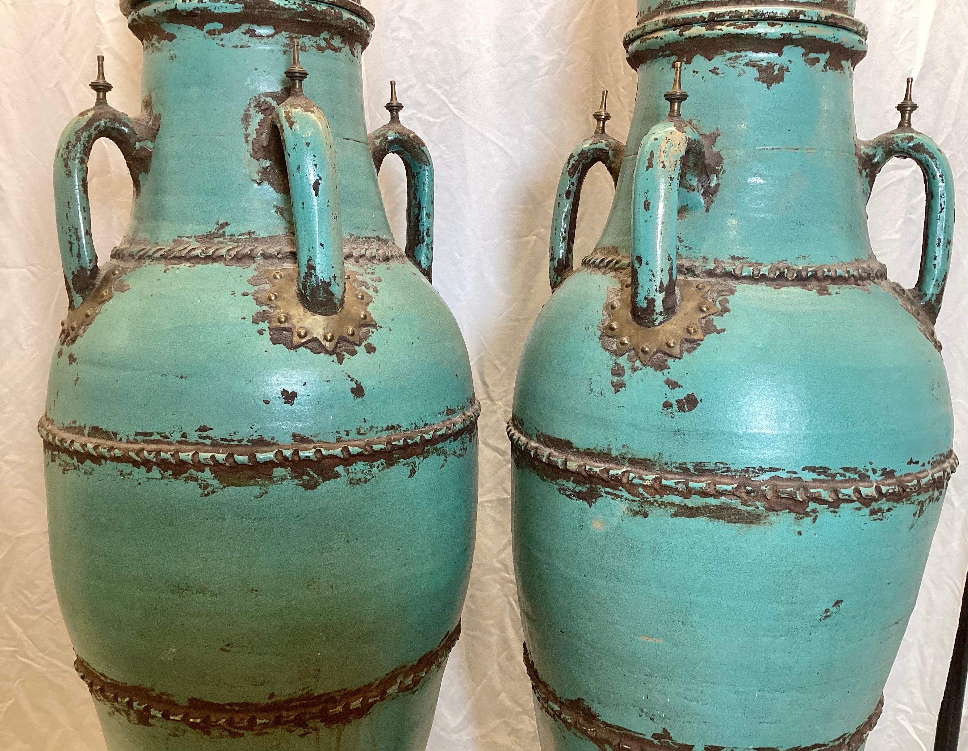 Glazed A Pair of Monumental Four Handled Tall Pottery Urns For Sale