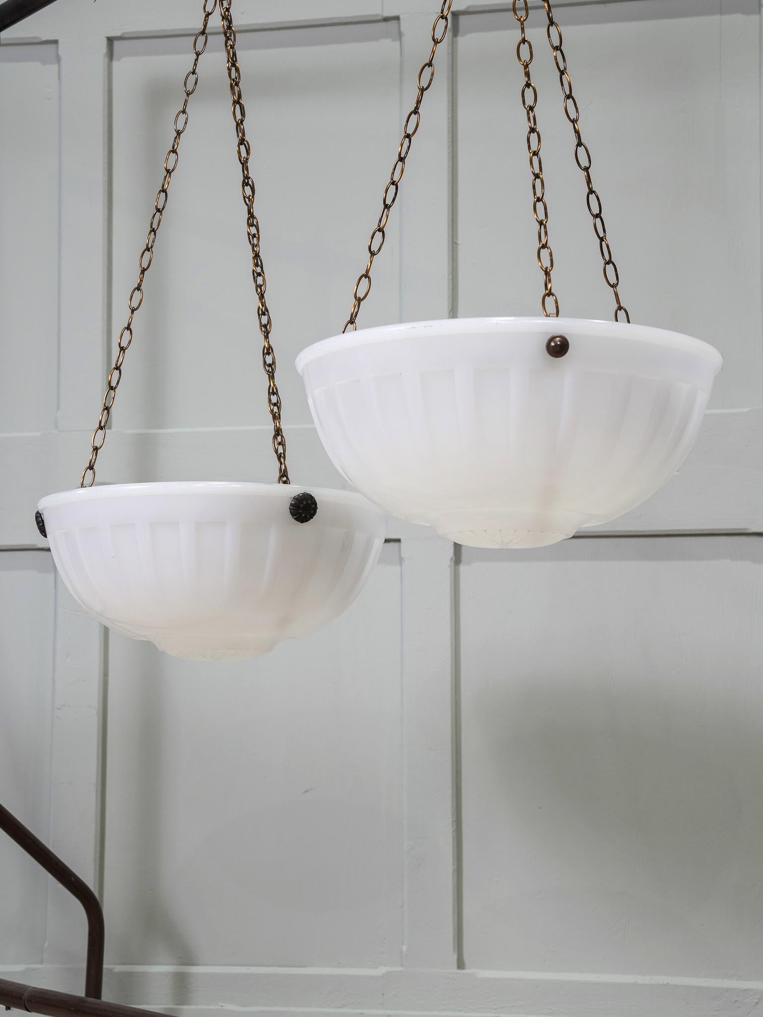 A pair of large opaline glass plaffonier ceiling lights by Jefferson.

Price is for the pair.