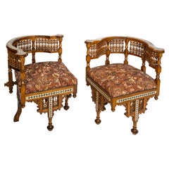 A Pair of Moorish-Style American Open Arm Chairs