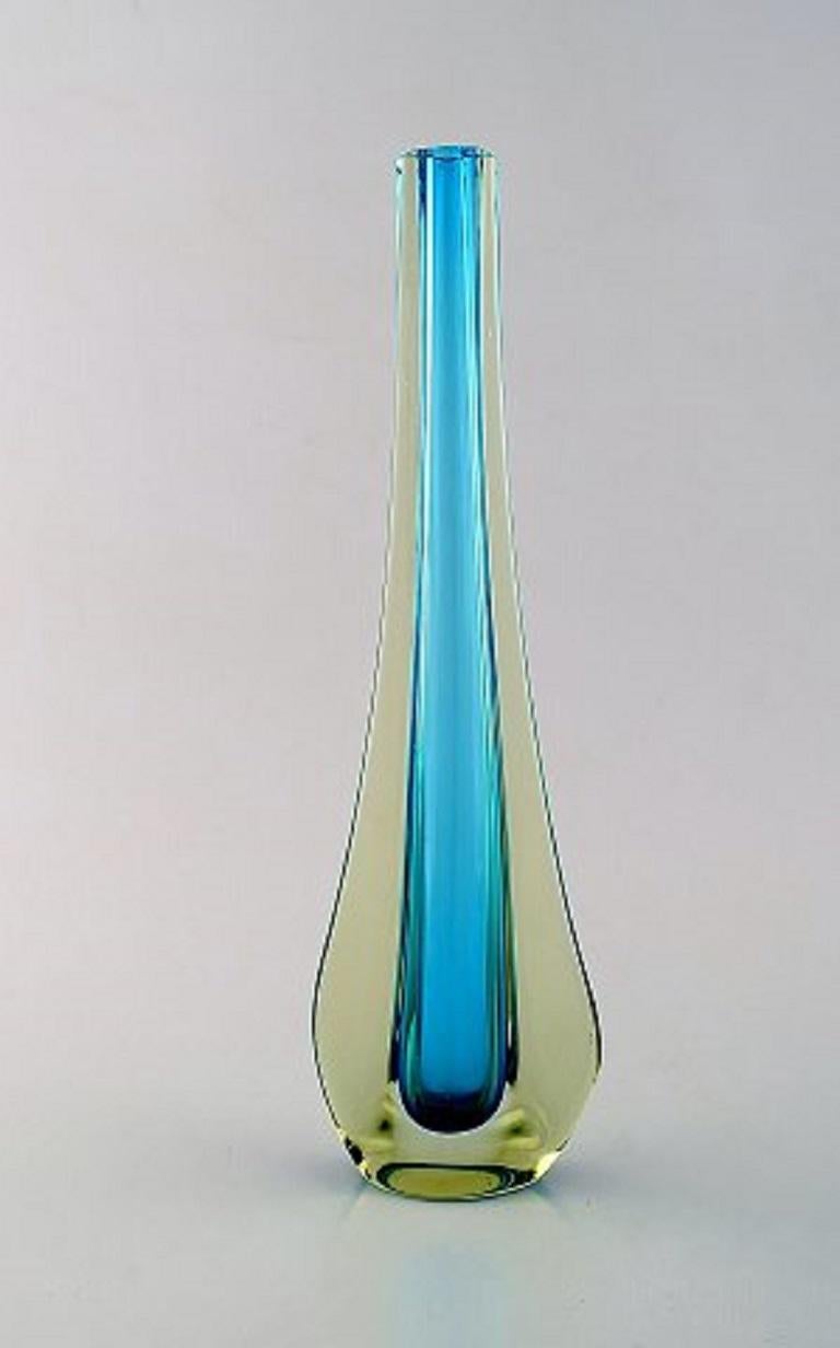 A pair of Murano vases in light blue and smoke colored, mouth-blown art glass, 1960s.
Measures: 32 x 9.5 cm.
In very good condition.