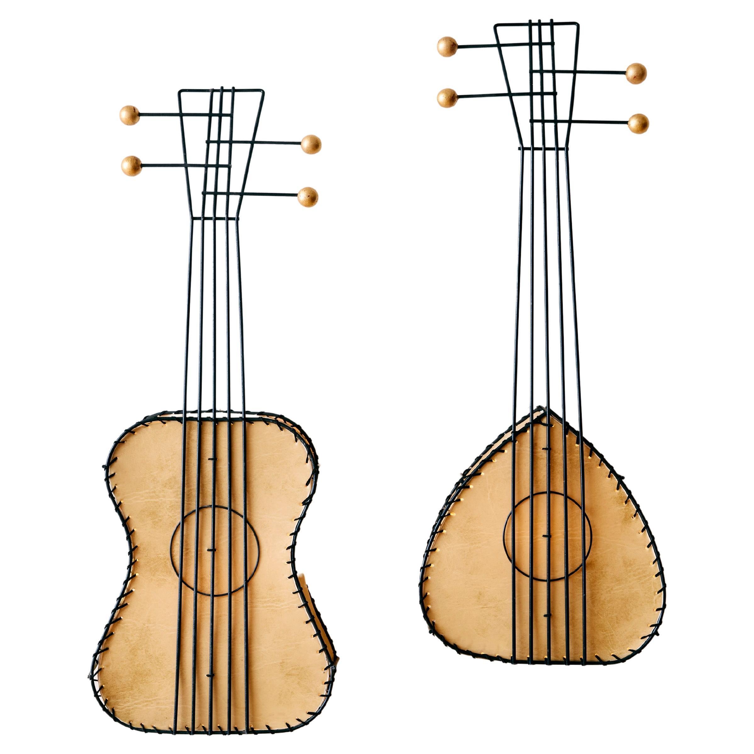 A Pair of Musical Instrument Wall Lamps by Frederic Weinberg