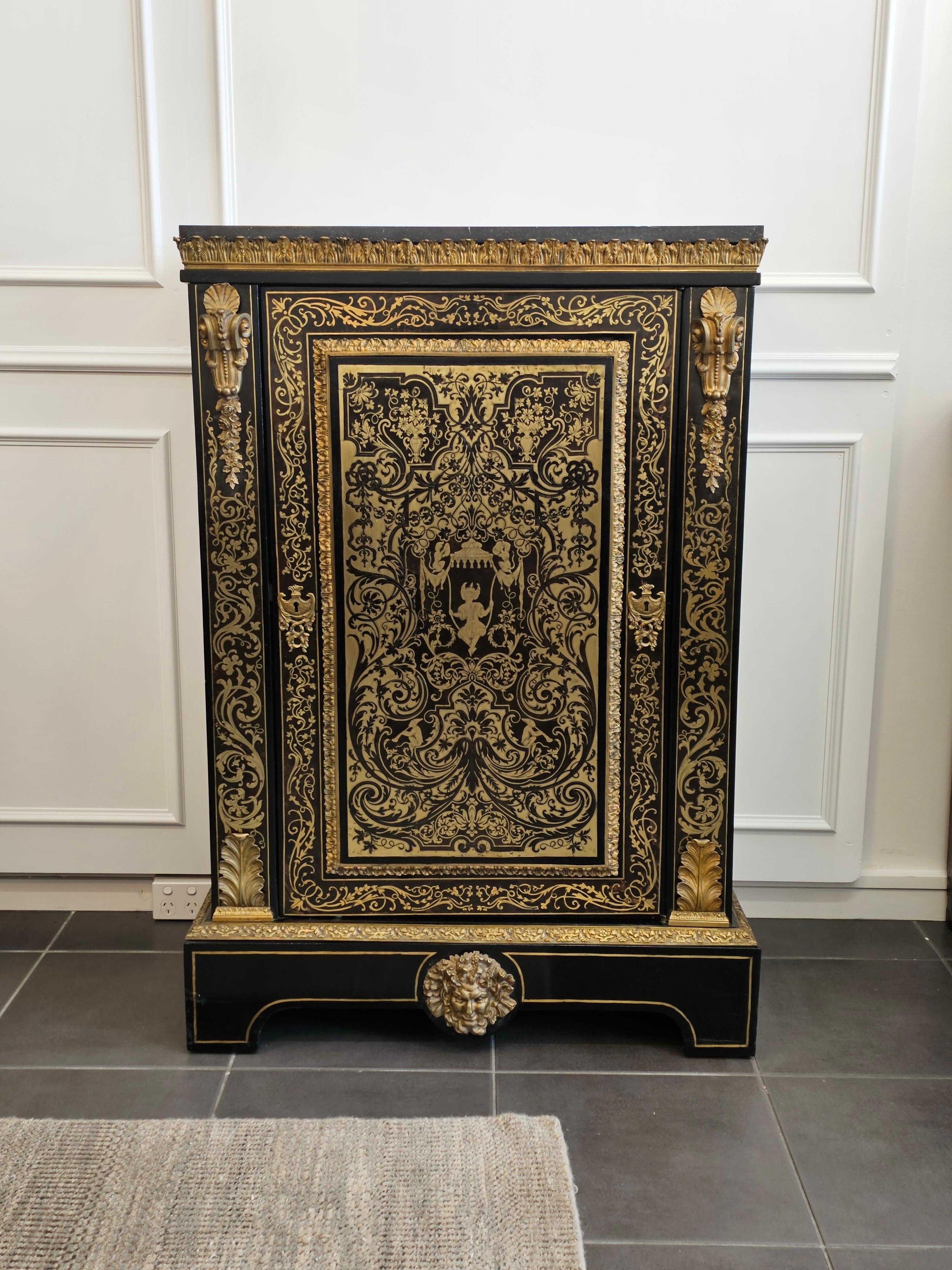 A Pair of Napoleon III Ormolu-Mounted Inlaid Boulle Pier Cabinets

A very fine pair of Boulle style Napoleon III Pier cabinets. The intricacies of the brass marquetry are complemented by ormolu motifs of Scallop Shells, Acanthus with beading,