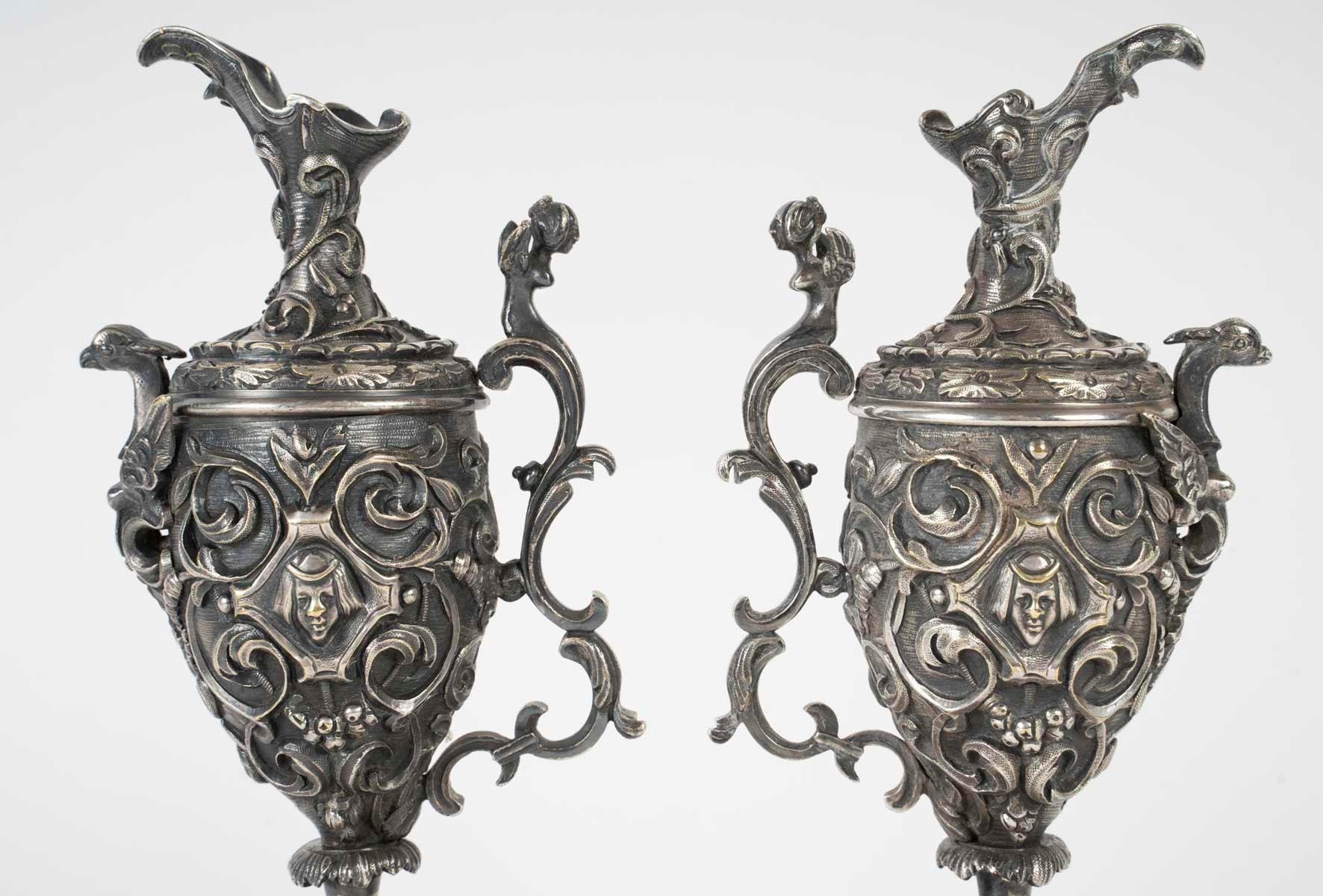 French A pair of Napoleon III Period Silvered Bronze Ewers with Griotte Marble Bases. For Sale