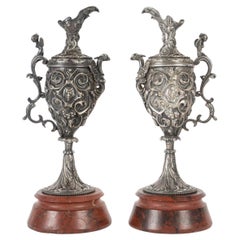 Antique A pair of Napoleon III Period Silvered Bronze Ewers with Griotte Marble Bases.