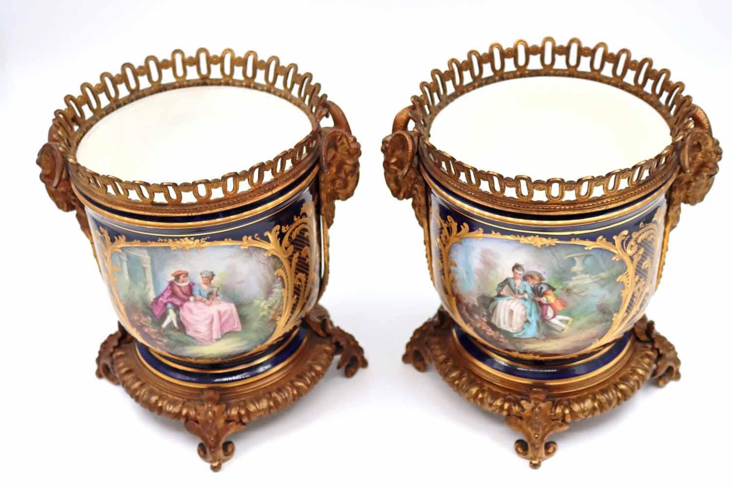 Pair of Napoleon III Porcelain and Gilt Bronze Planters 1