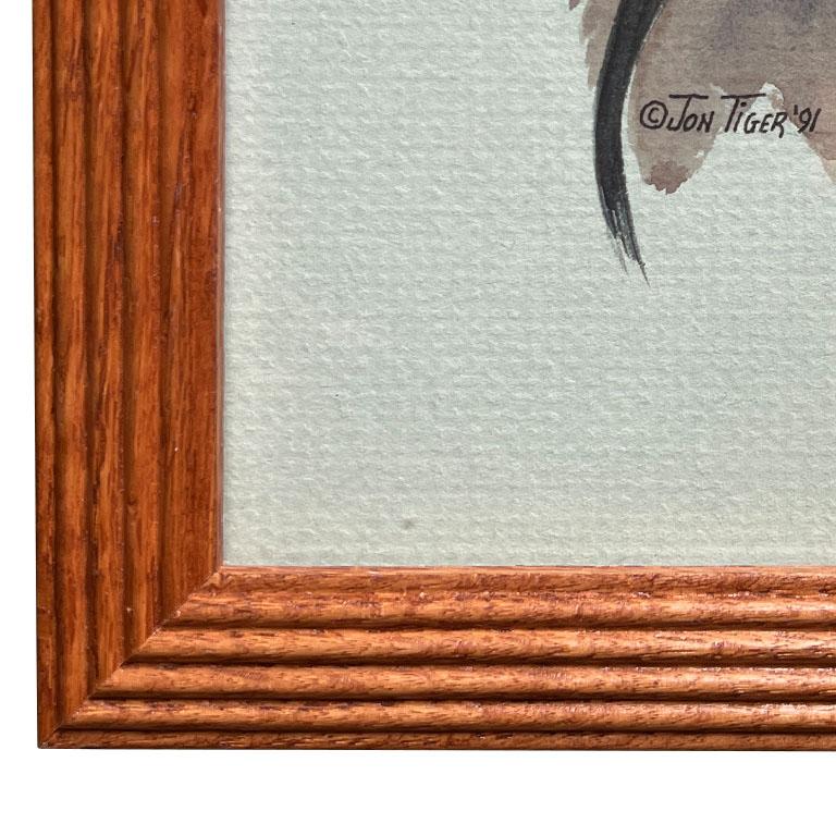 Wood A pair of Native American Framed Paintings of Man and Woman - Signed Jon Tiger For Sale
