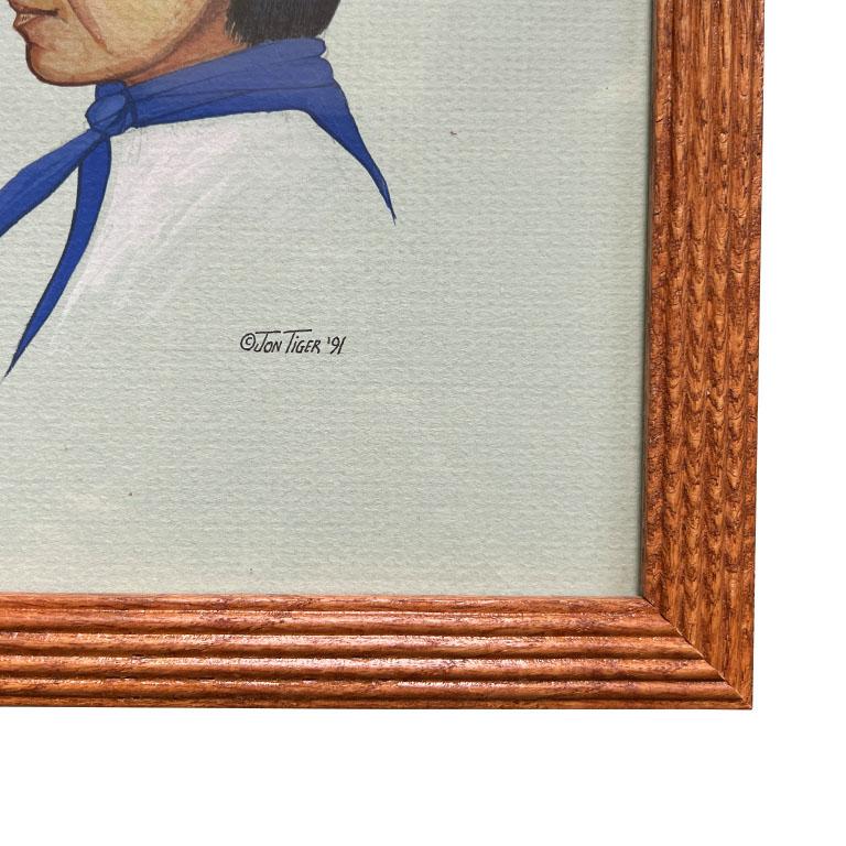 A pair of Native American Framed Paintings of Man and Woman - Signed Jon Tiger For Sale 1