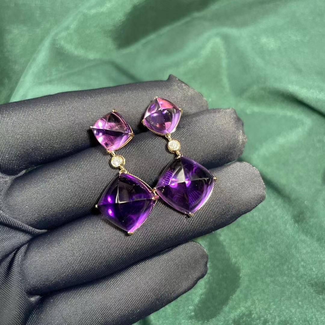 Amethyst sugarloaf and Diamond Earring in 18k Rose Gold

Total Amethyst weight is 29.44ct all natural without any treatment
Total Natural Diamond weight is 0.1ct, The Colour of the Diamond is Approximately E/F with VS Clarity  

in EOSTRE 2022