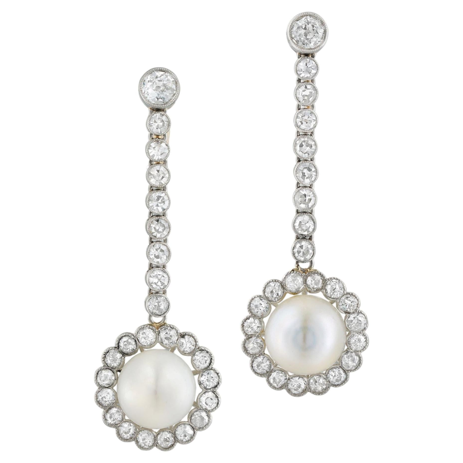A pair of natural pearl and diamond cluster drop earrings For Sale