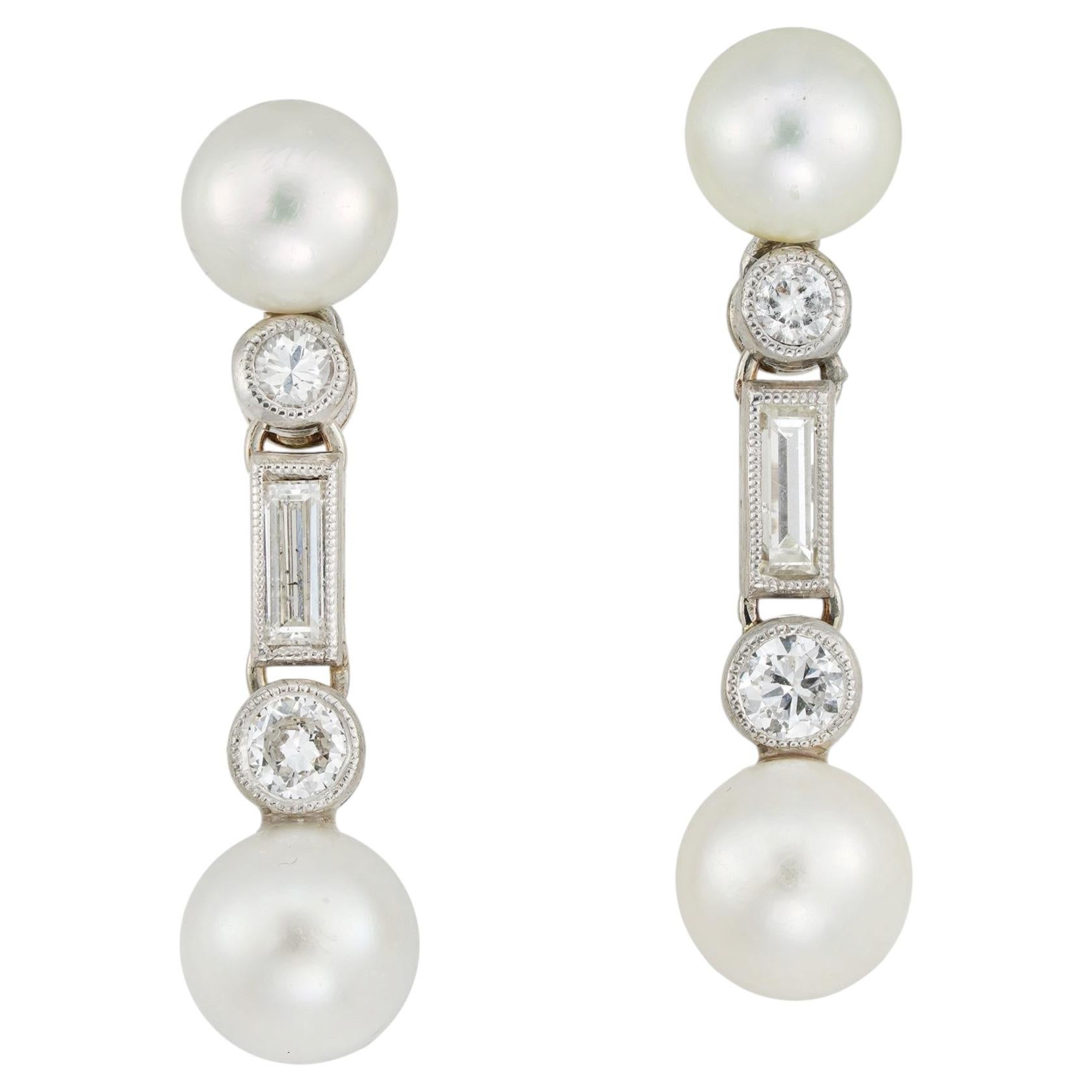 A pair of natural pearl and diamond drop earrings For Sale