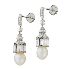 A pair of natural pearl and diamond lustre earrings