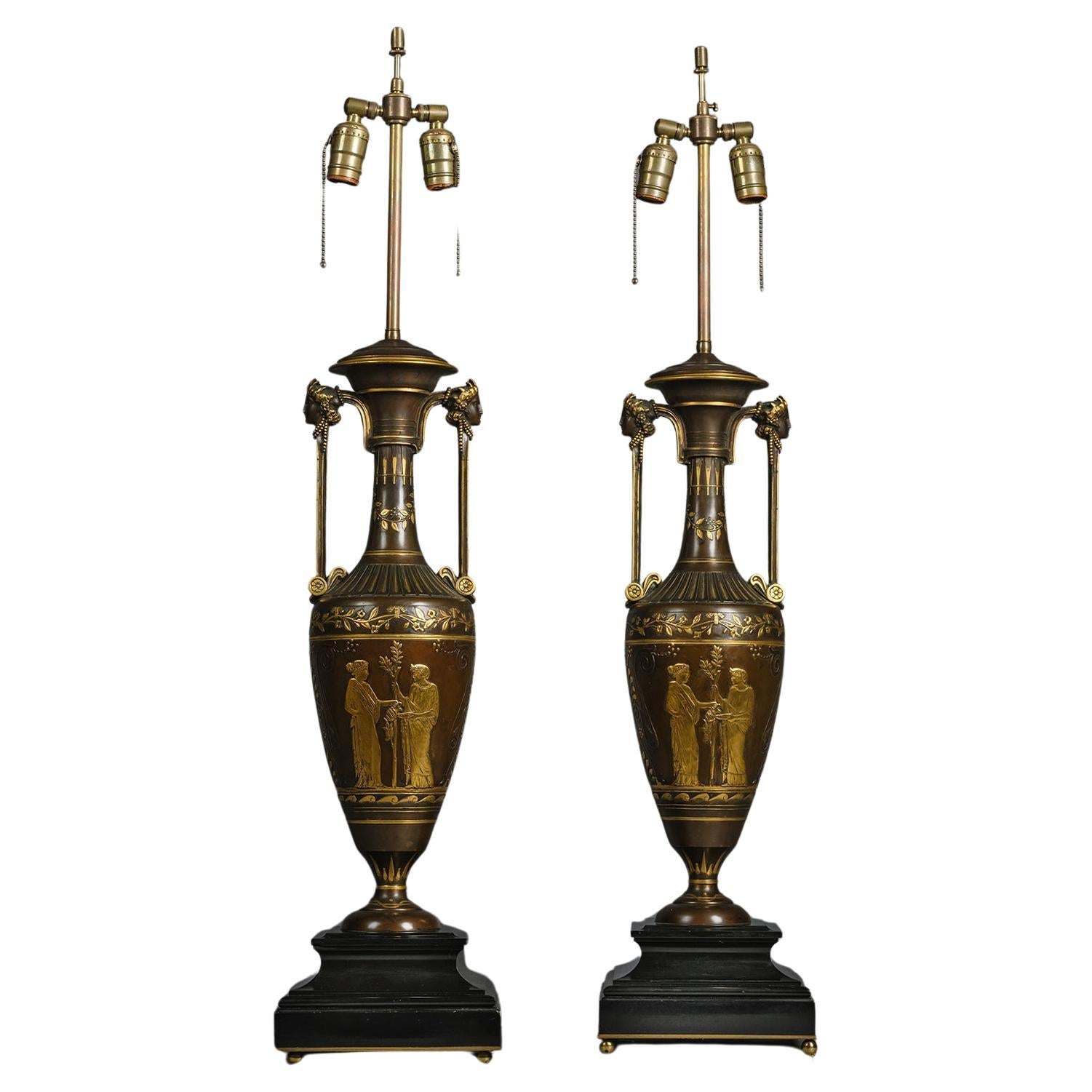 A Pair of Néo-Grec Parcel-Gilt Patinated Bronze Vases Mounted as Lamps For Sale