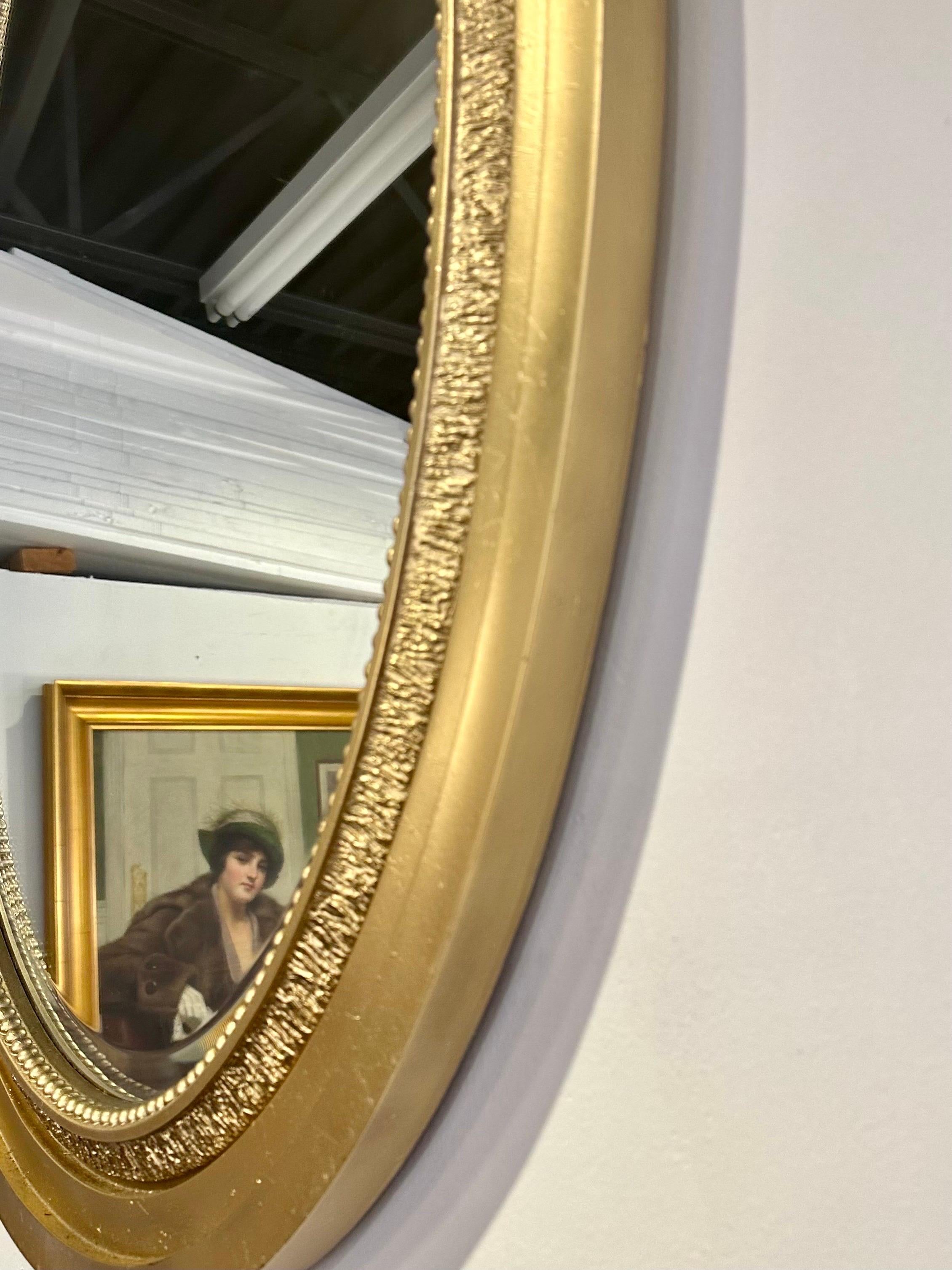 Pair of Neoclassical Gilded Wood Oval Mirrors In Good Condition For Sale In Miami, FL