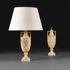A Pair of Neoclassical Honey Onyx Urn Lamps