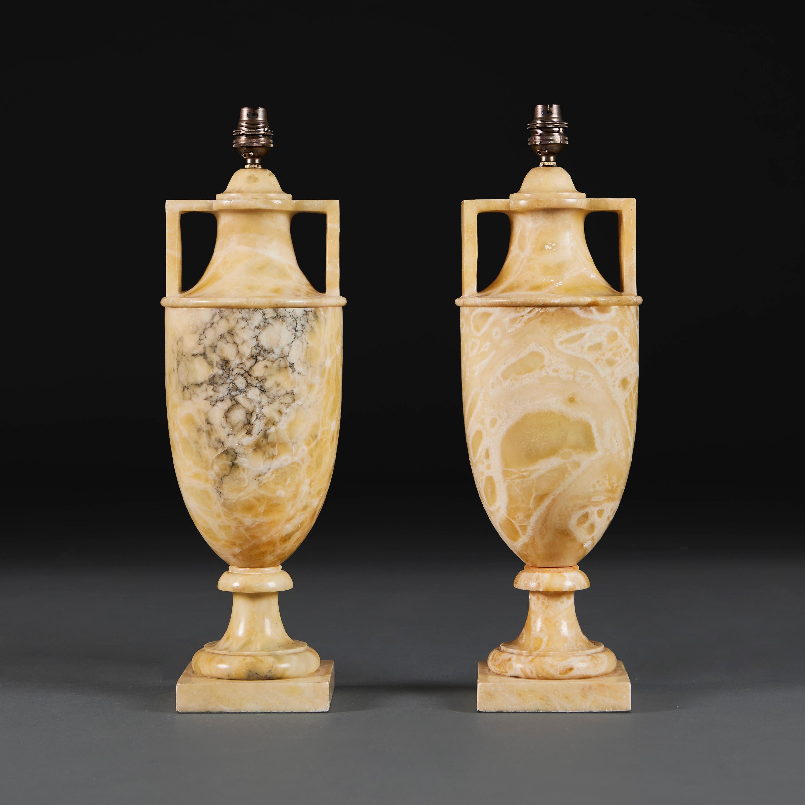 Italian A Pair of Neoclassical Honey Onyx Urn Lamps  For Sale