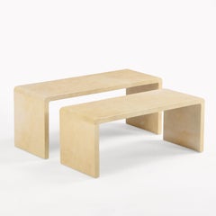 A Pair of Nesting Parchment Covered Coffee Tables.
