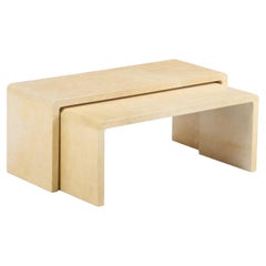 A Pair of Nesting Parchment Covered Coffee Tables.