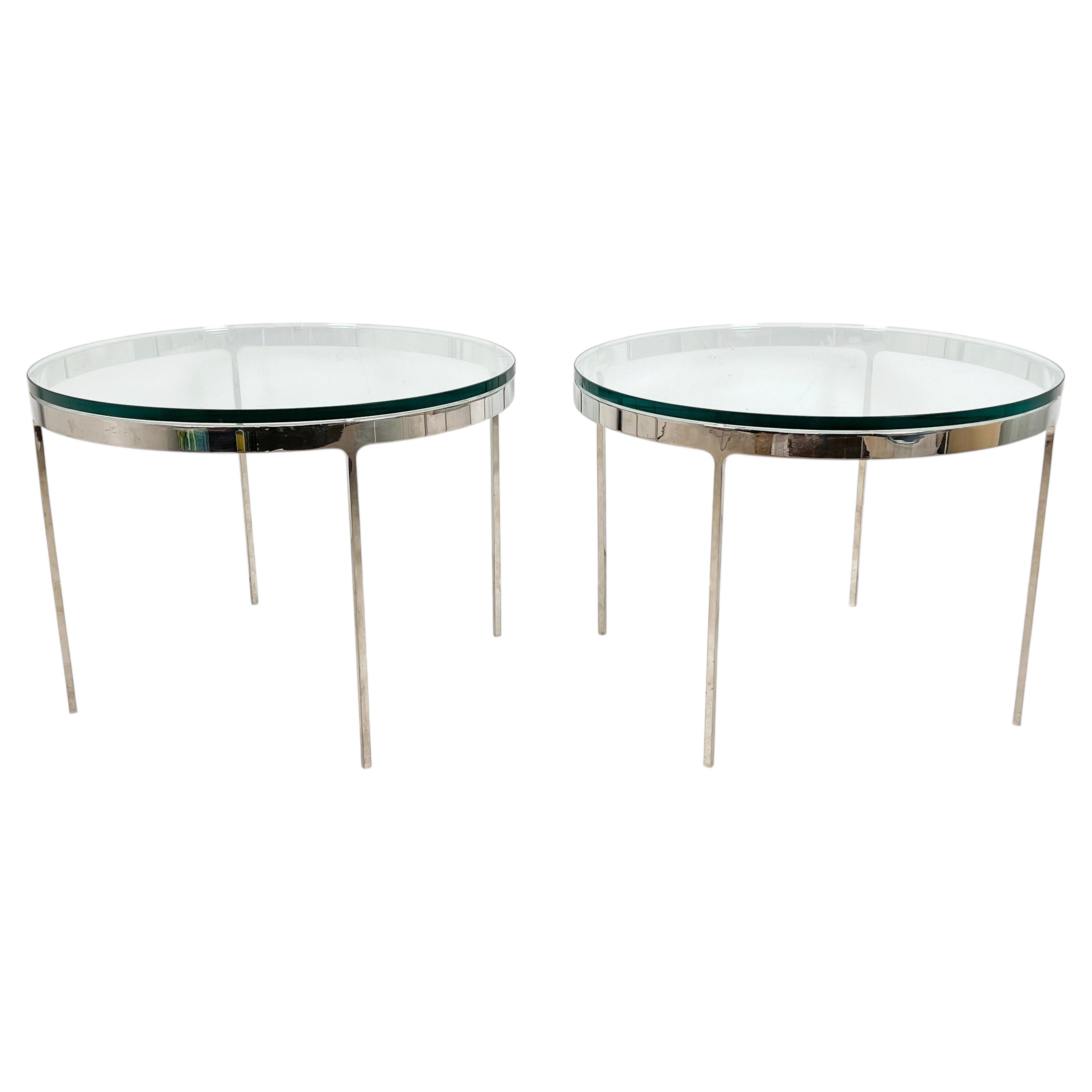 A Pair of Nicos Zographos Side Tables in Polished Steel With Glass Tops