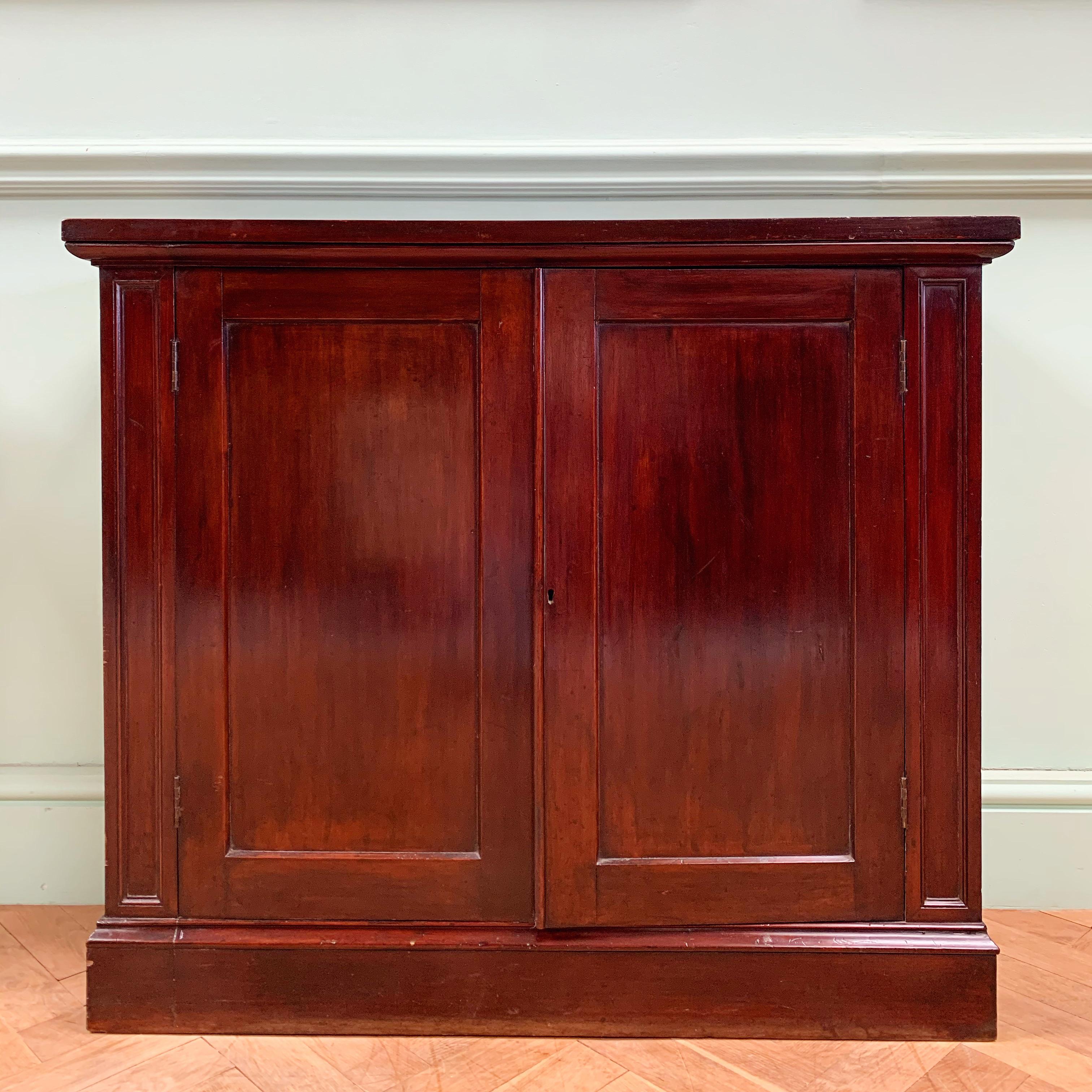 An elegant pair of enclosed consoles of classical proportions with two fielded doors flanked by recessed pilasters with later Seravezza verde marble tops. 

English, Early Nineteenth Century

Inquire about this piece

H 32 1/2 x W 37 1/4 x D 12 1/2