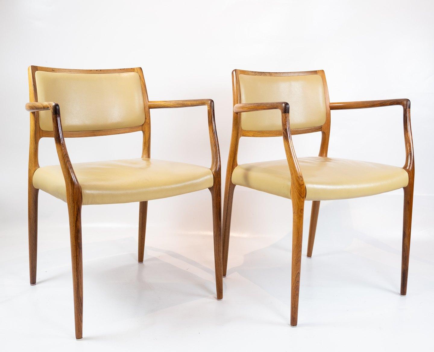 A few N.O. Møller armchairs, model 65, in rosewood and light leather, manufactured by J.L. Møller in the late 1960s and designed in 1968.

These armchairs are an exemplary expression of Danish furniture craftsmanship and design from that era. The