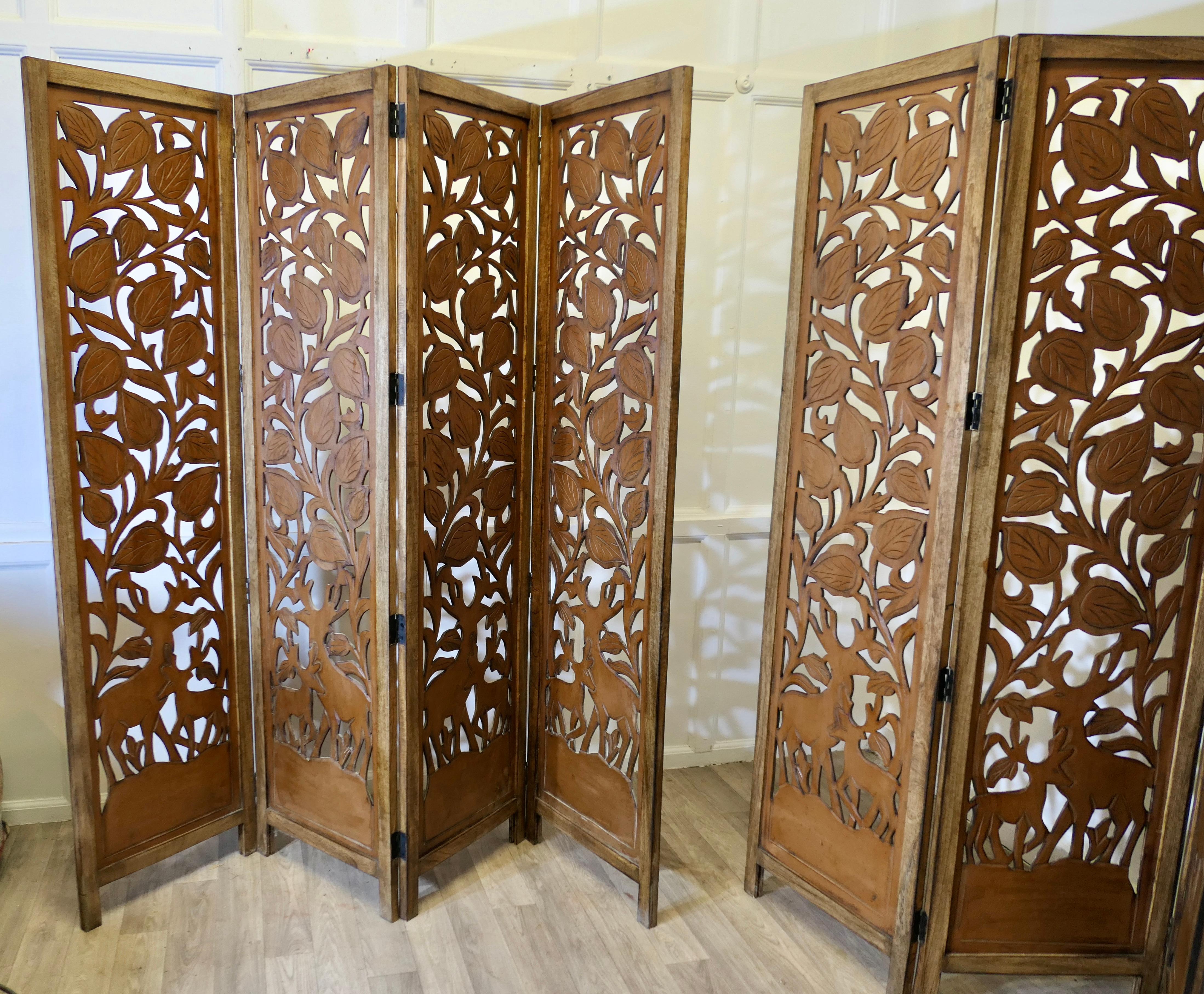 Teck A Pair of North African Carved Pierced 4 Fold Screens en vente