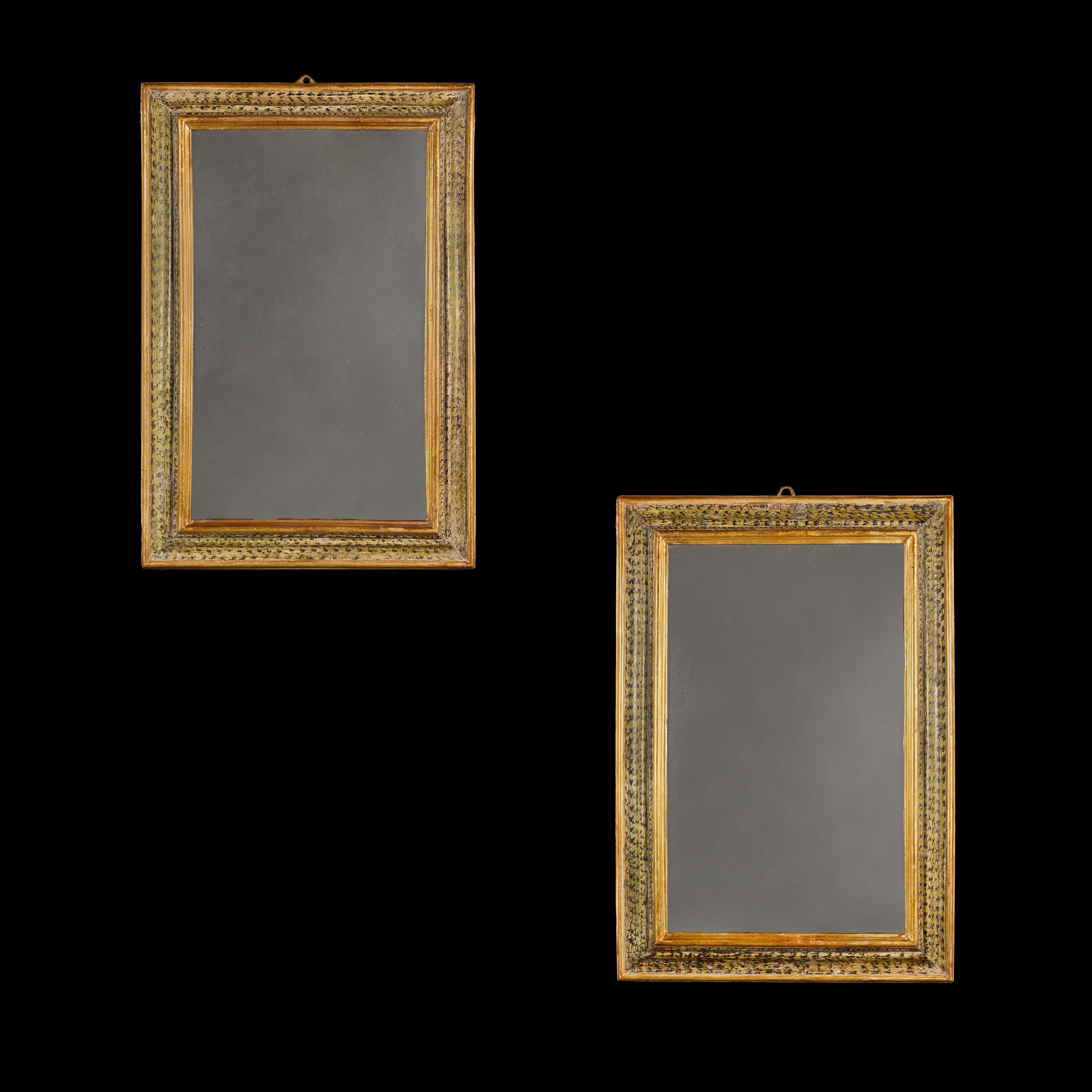 Italy, probably Piedmont, circa 1780

A pair of late 18th century North Italian mirrors with painted frames, the variegated green paintwork with giltwood borders.

Height 94.00cm
Width 64.00cm