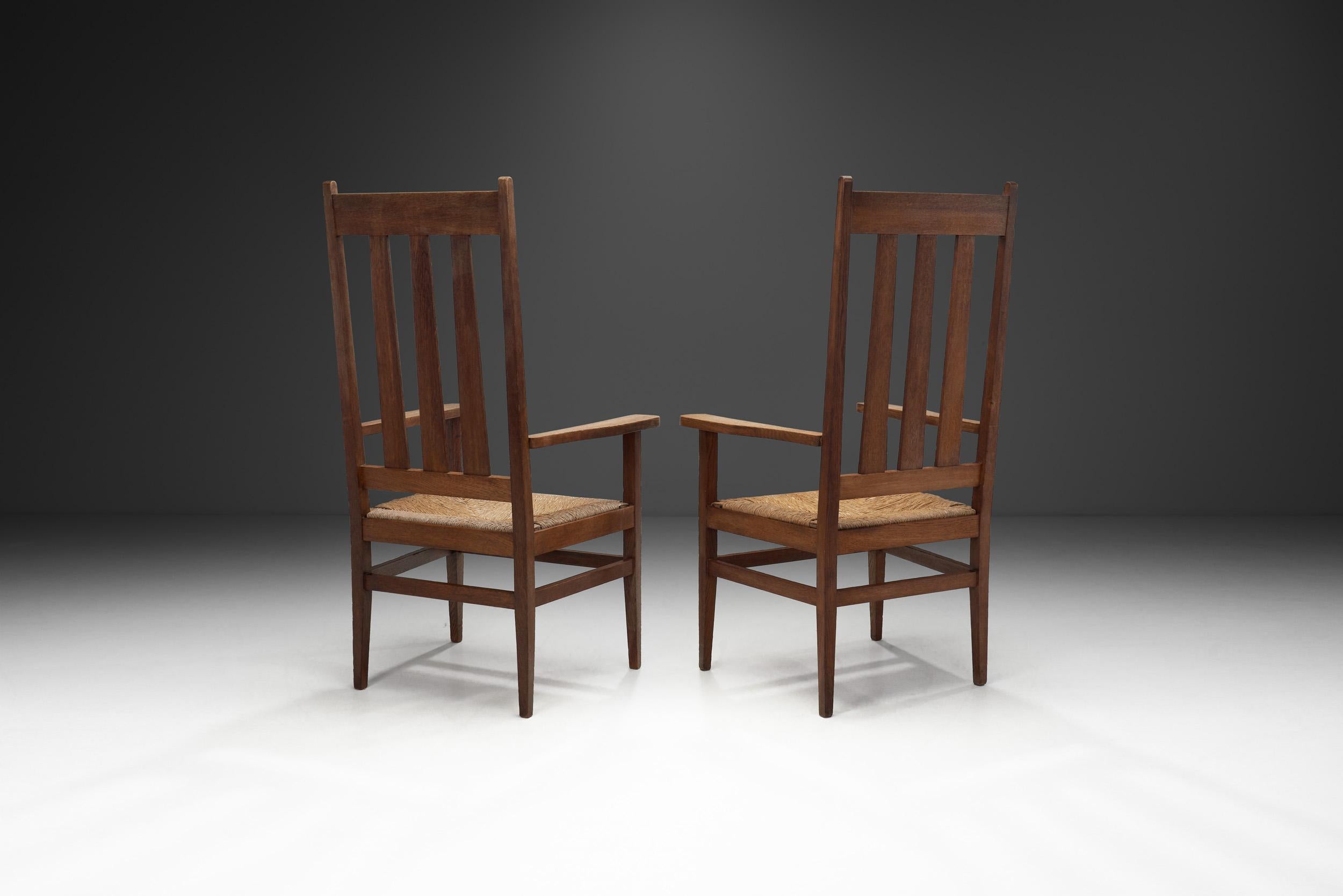 French A Pair of Oak and Woven Rush High Back Armchairs, France 1940s For Sale