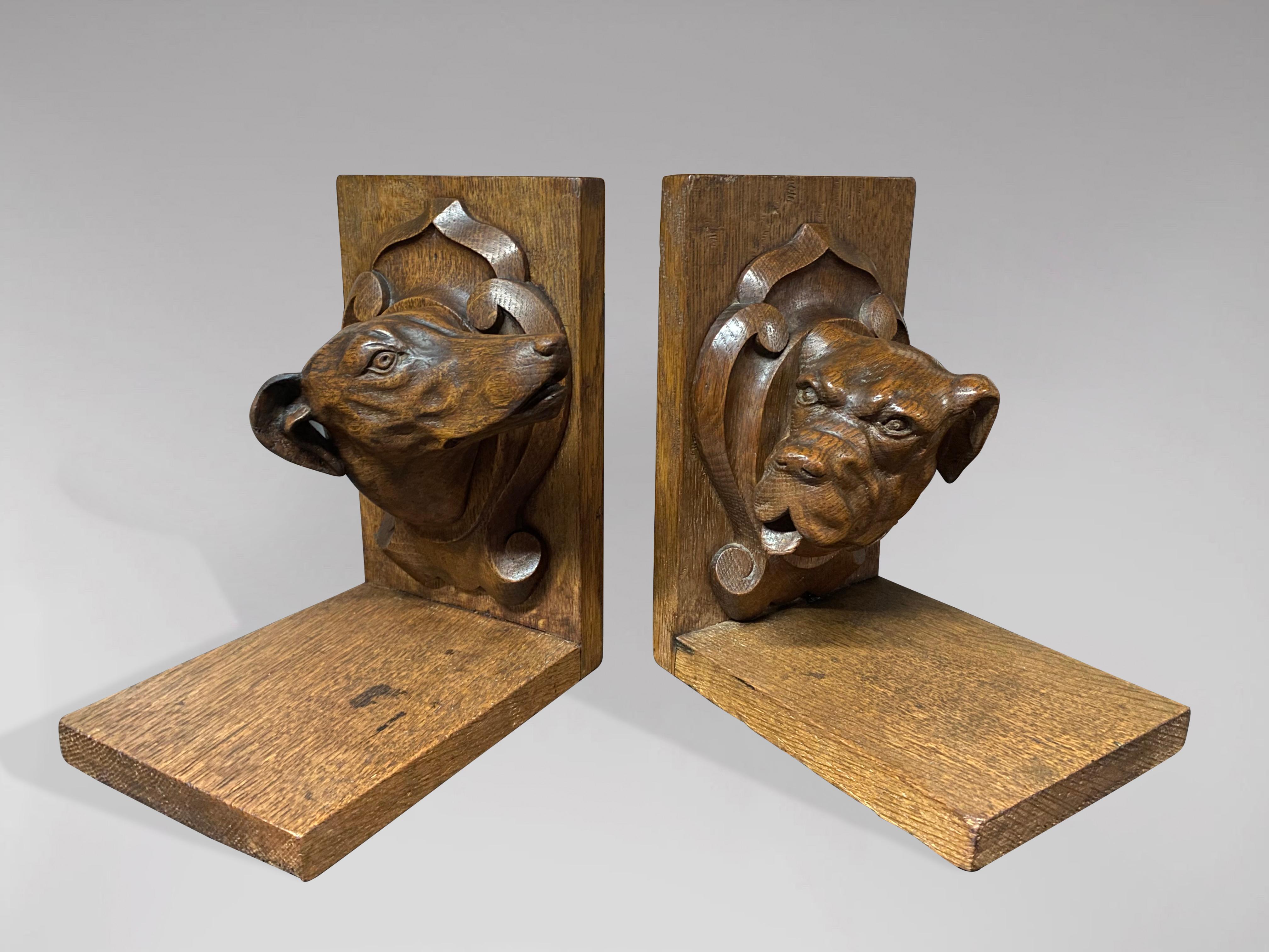 A fine pair of antique animalier bookends. Displaying a desirable aged patina and in good original order throughout. Superior craftsmanship to each portrait, realised in quality oak, representing a bulldog and a greyhound, mounted skilfully upon oak