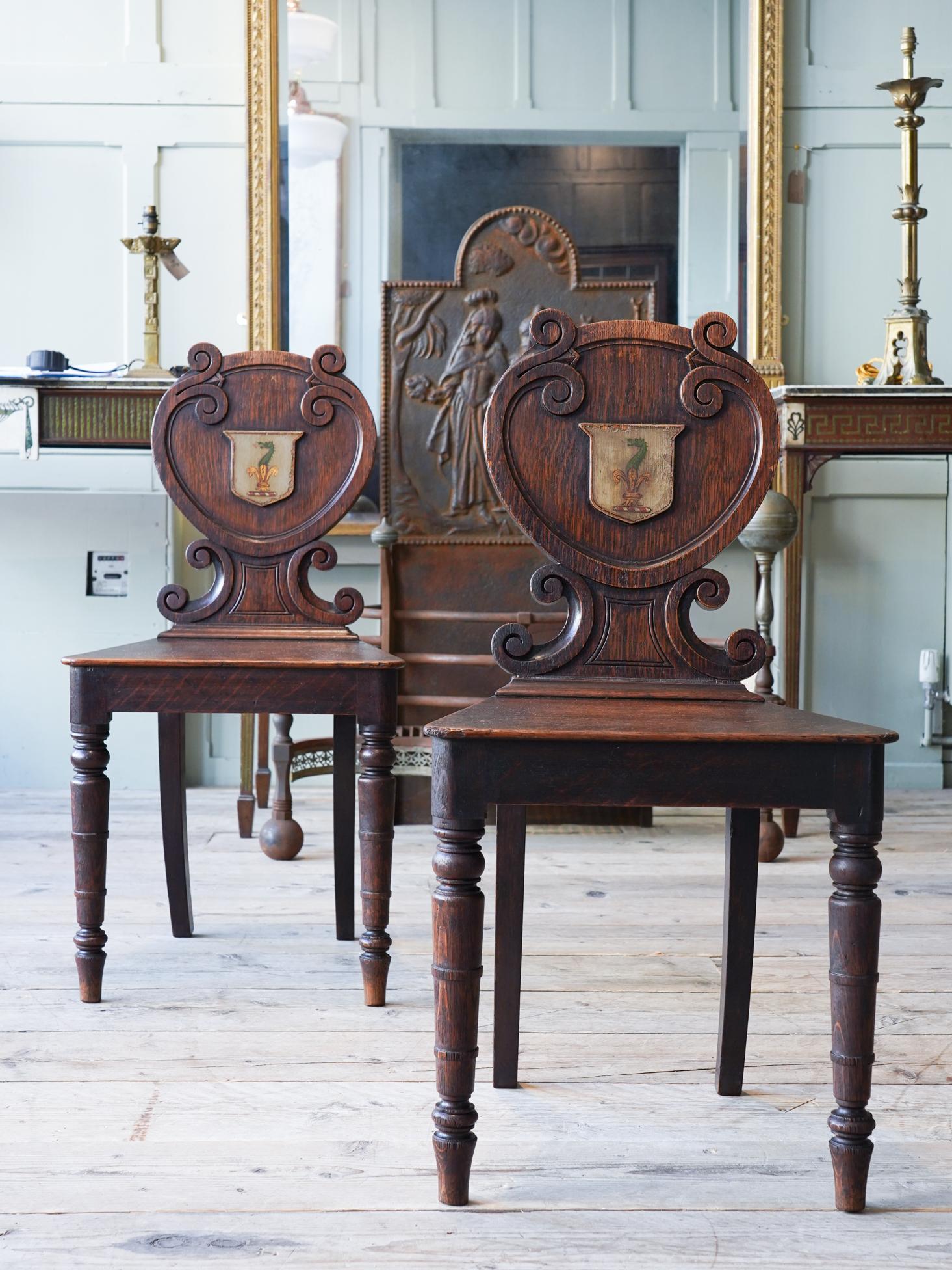 English Pair of Oak Armorial Hall Chairs