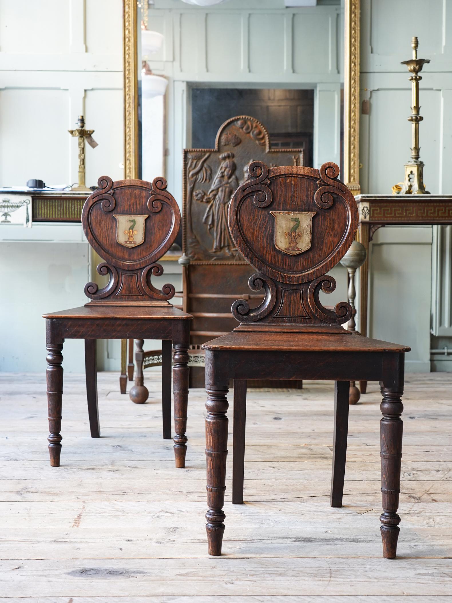 Pair of Oak Armorial Hall Chairs In Good Condition In Conwy, GB