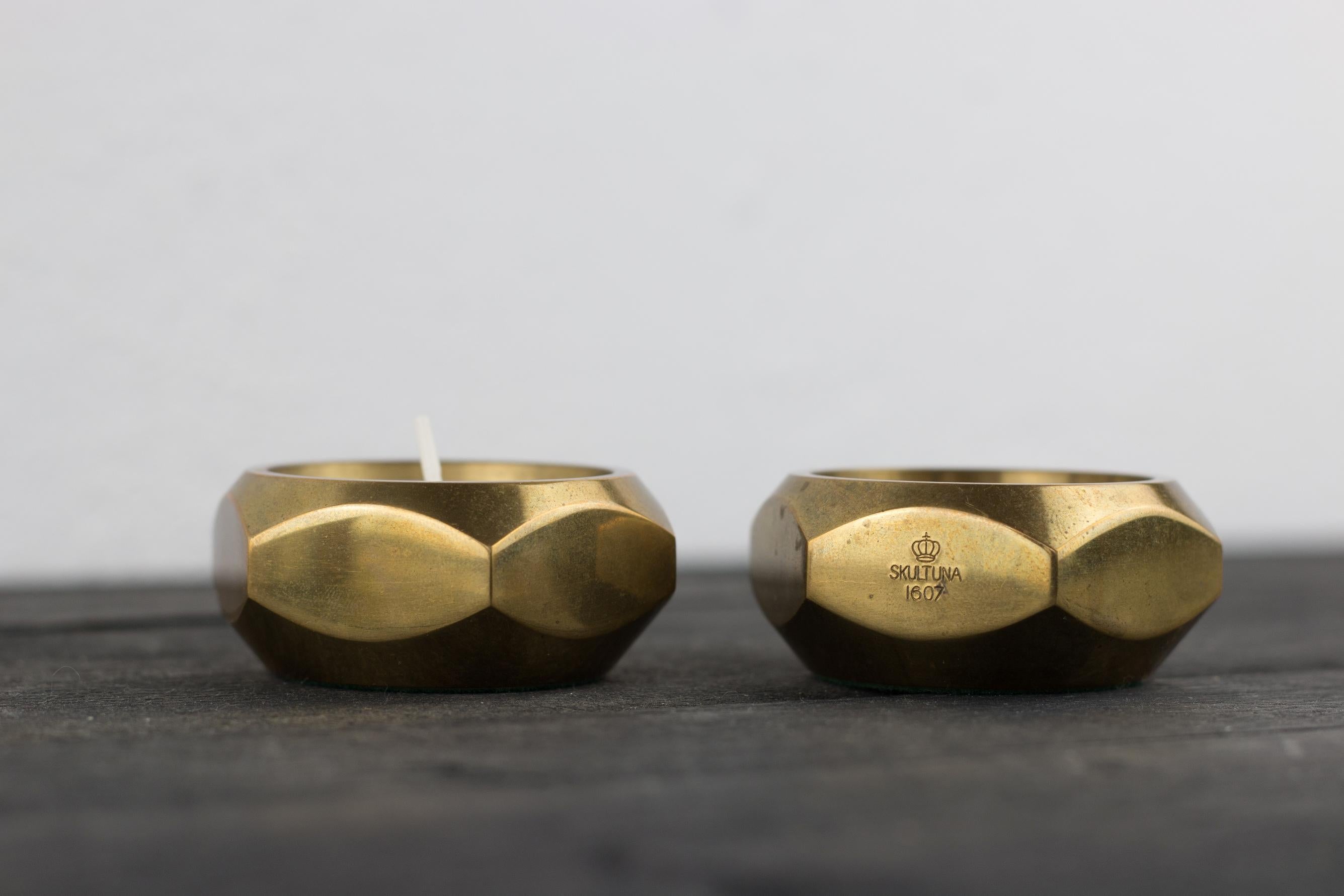 Swedish a pair of octagonal brass candle holders by Pierre Forsell for Skultuna For Sale