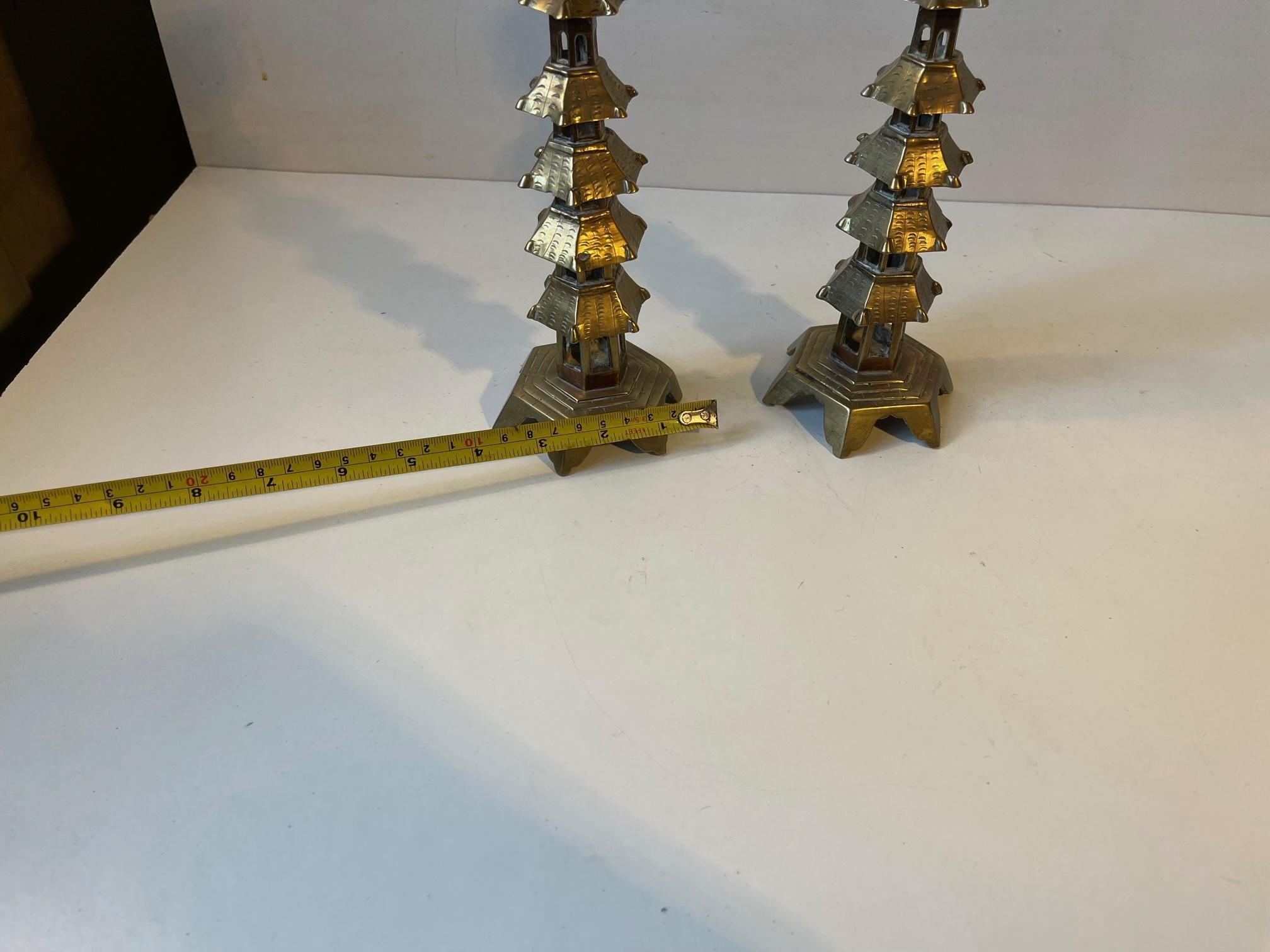 Mid-20th Century Pair of Old Chinese Pagoda Candlesticks in Brass For Sale