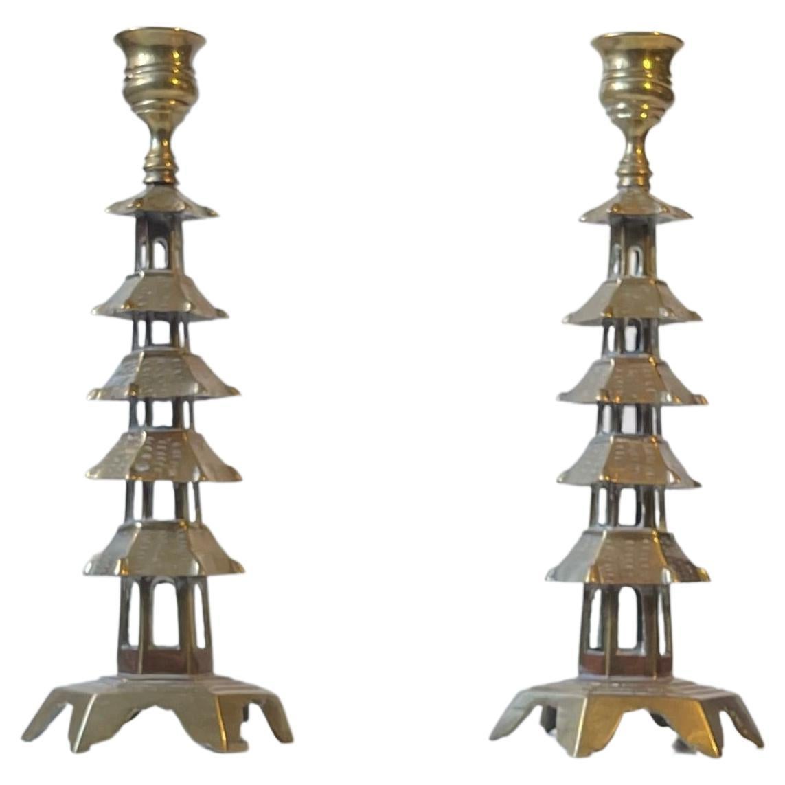 Pair of Old Chinese Pagoda Candlesticks in Brass For Sale