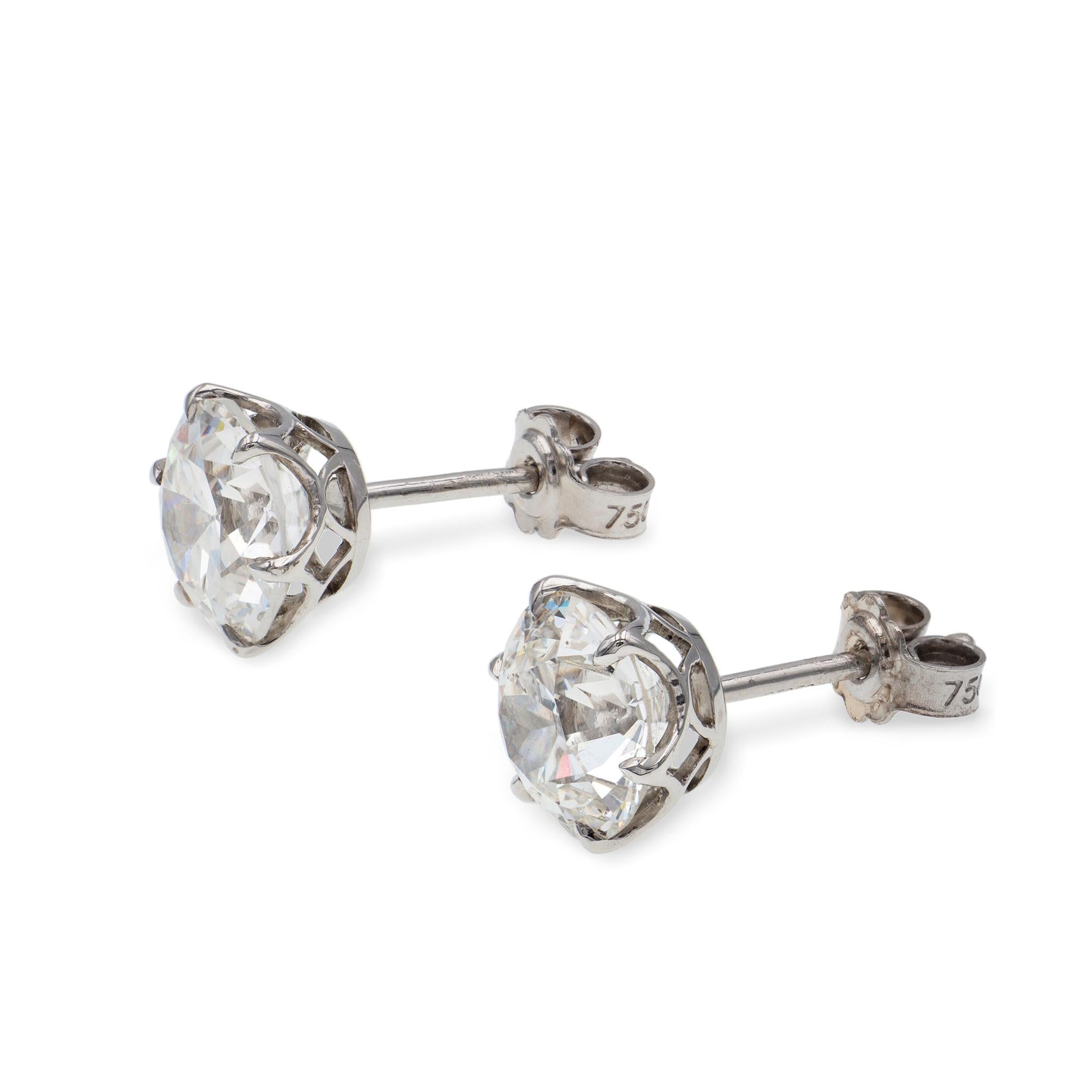 A pair of old-cut diamond stud earrings, the 2.07 carats diamond accompanied by HRD report 170002961964 stating to be of G colour VS2 clarity, the 2.10 carats diamond accompanied by GIA report 5192334059 stating to be of G colour, SI2 clarity, both