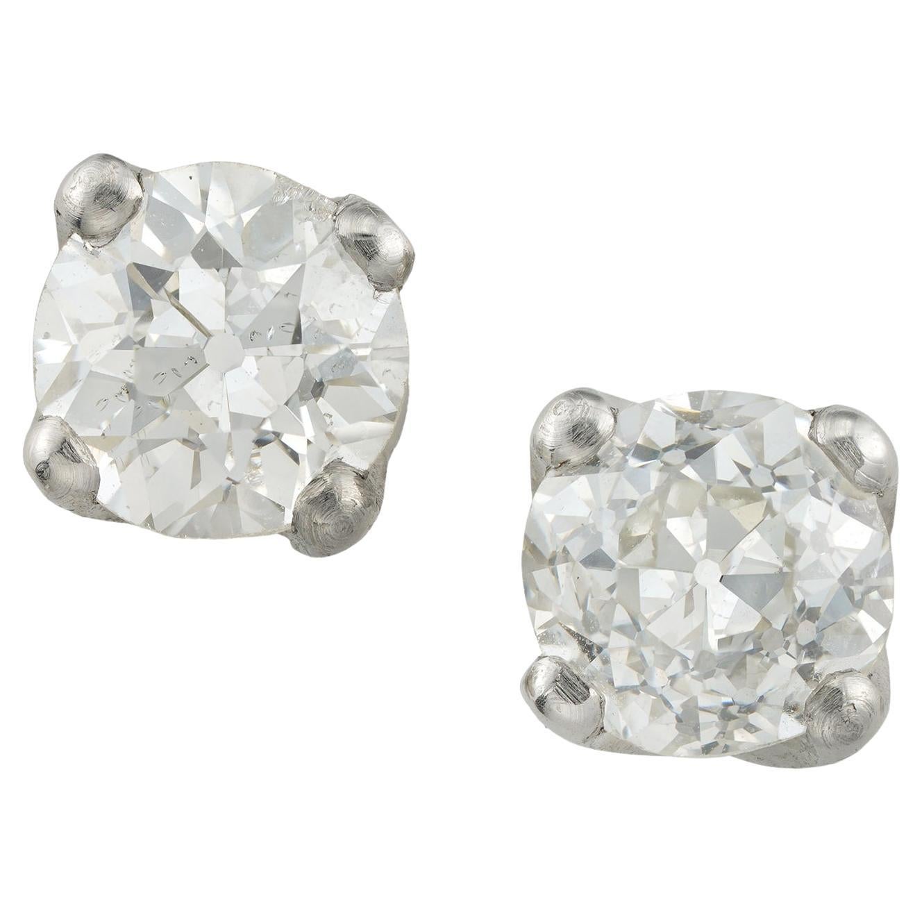 A pair of old-cut diamond stud earrings For Sale