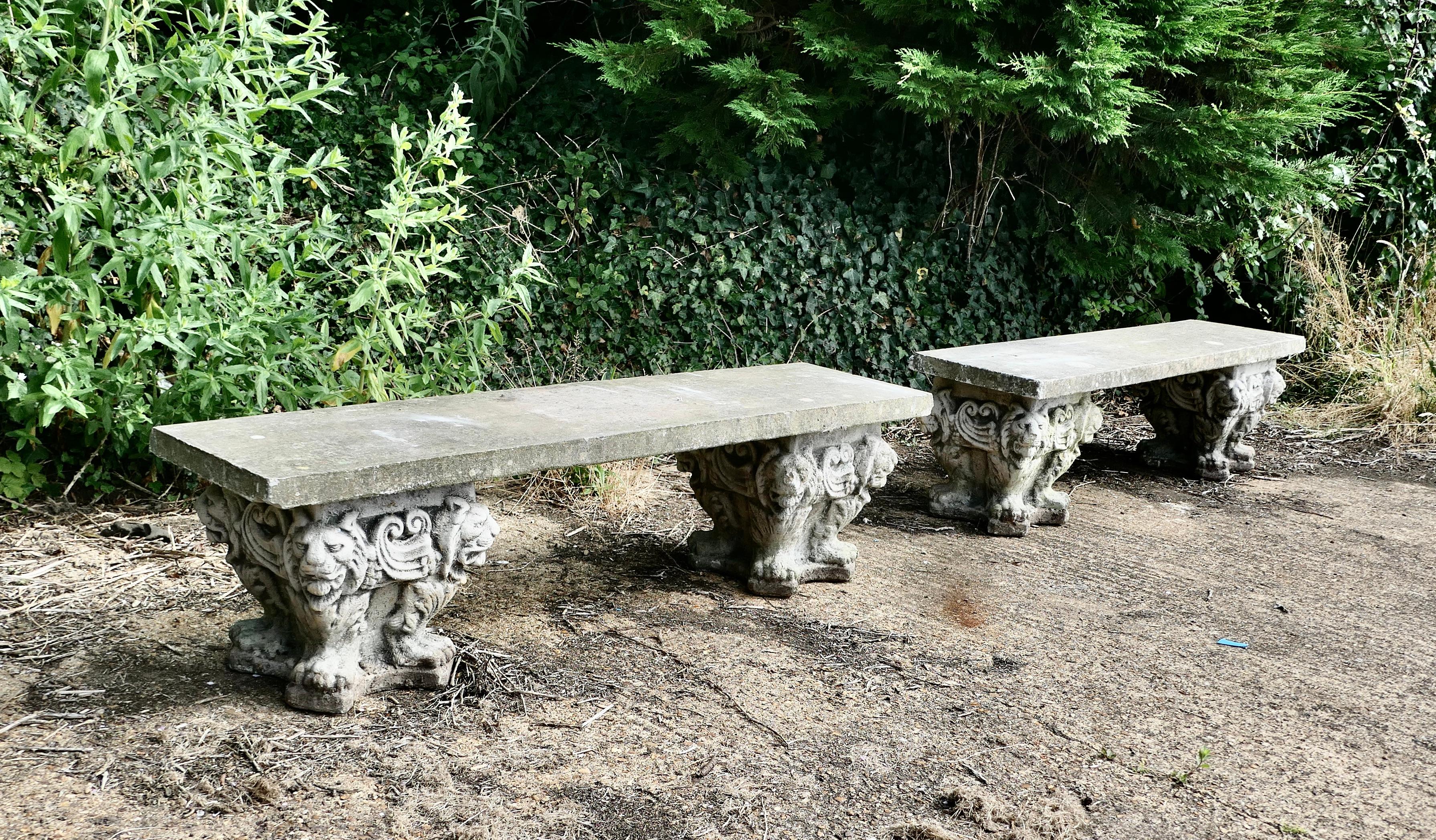 A pair of Old Gothic Weathered Stone Garden Benches

Delightfully decorated benches in the gothic style, each of the benches consists of a reconstituted stone plank top set on a pair of gothic 3 dimensional bases, these all have fierce Lions masks
