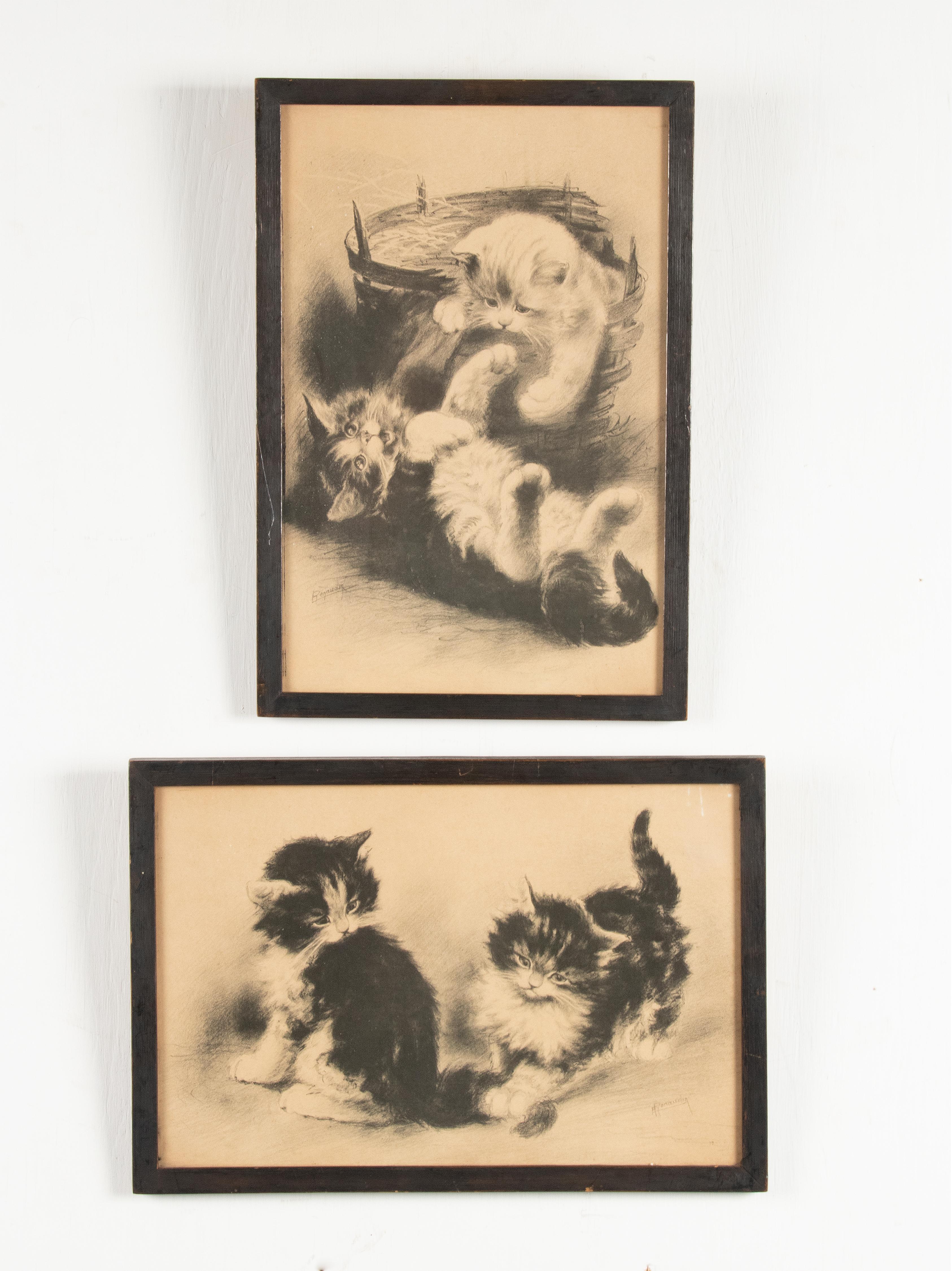 A pair of old prints depicting playing cats. The works are framed in a simple blackened wooden frame. The works are signed Renaudin. This was a well-known French painter who mainly painted landscapes and interiors.
The prints are framed behind