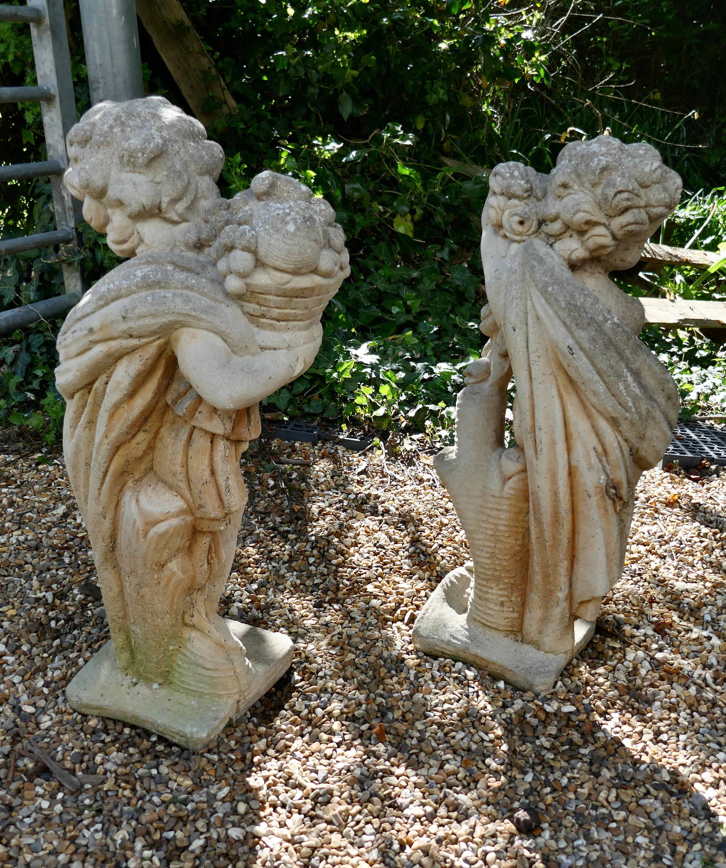 Pair of Old Weathered Classical Flower Children Statues In Good Condition For Sale In Chillerton, Isle of Wight