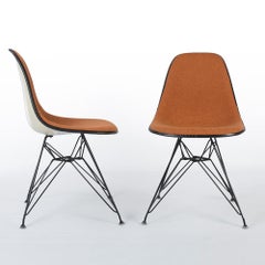 Pair of Orange and White Herman Miller Eames DSR Dining Side Chair