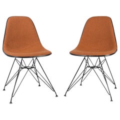 Pair of Orange and White Herman Miller Eames DSR Dining Side Chair