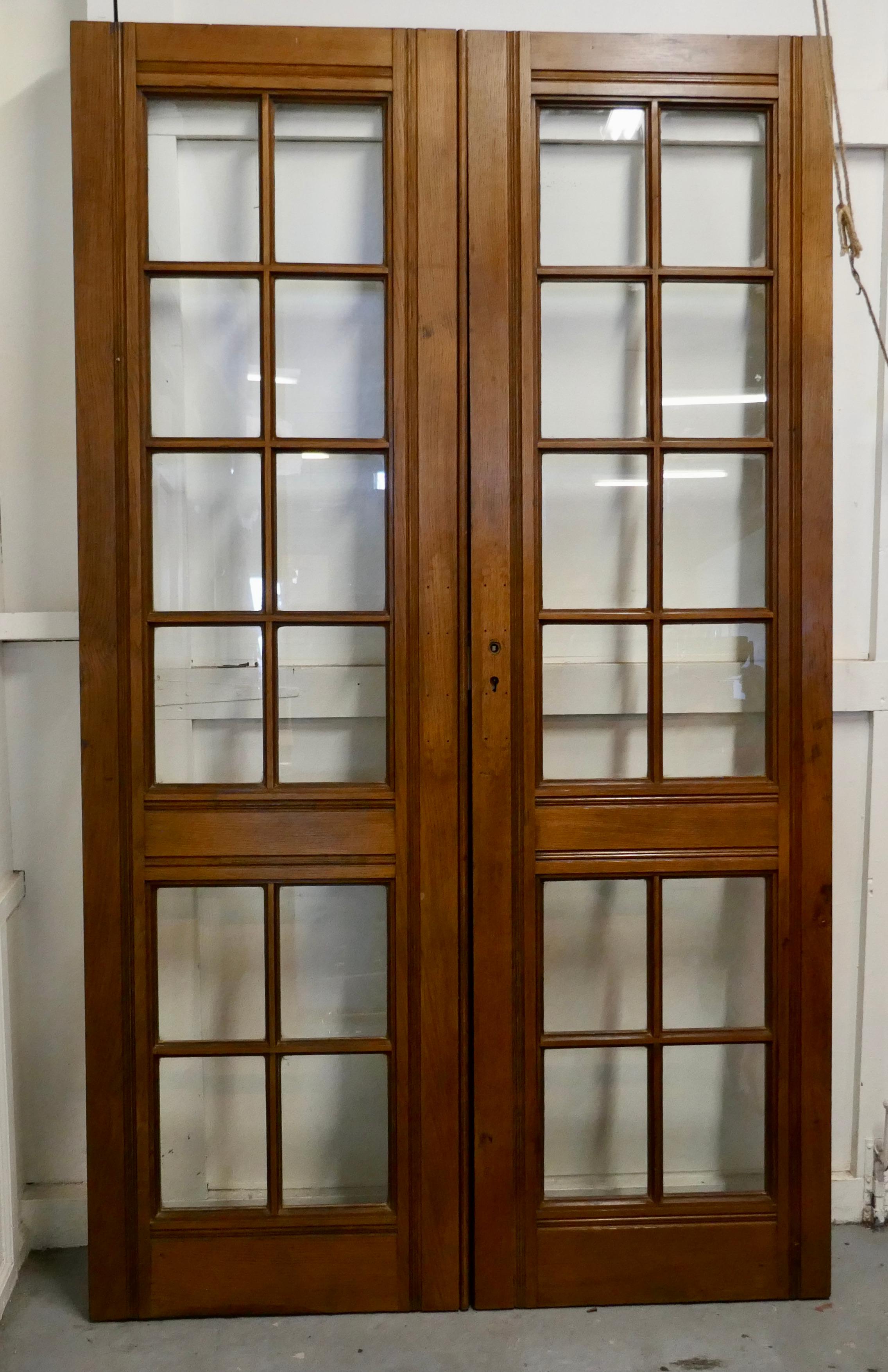 A pair of original 19th century glazed oak double doors

These are a craftsman made pair of deers, they each have 12 panes of glass from top to bottomed made in 2” thick Golden oak, needless to say these are a very heavy pair
They are in good