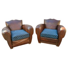 A pair of original Art Deco French Moustache leather club chairs. France 1930