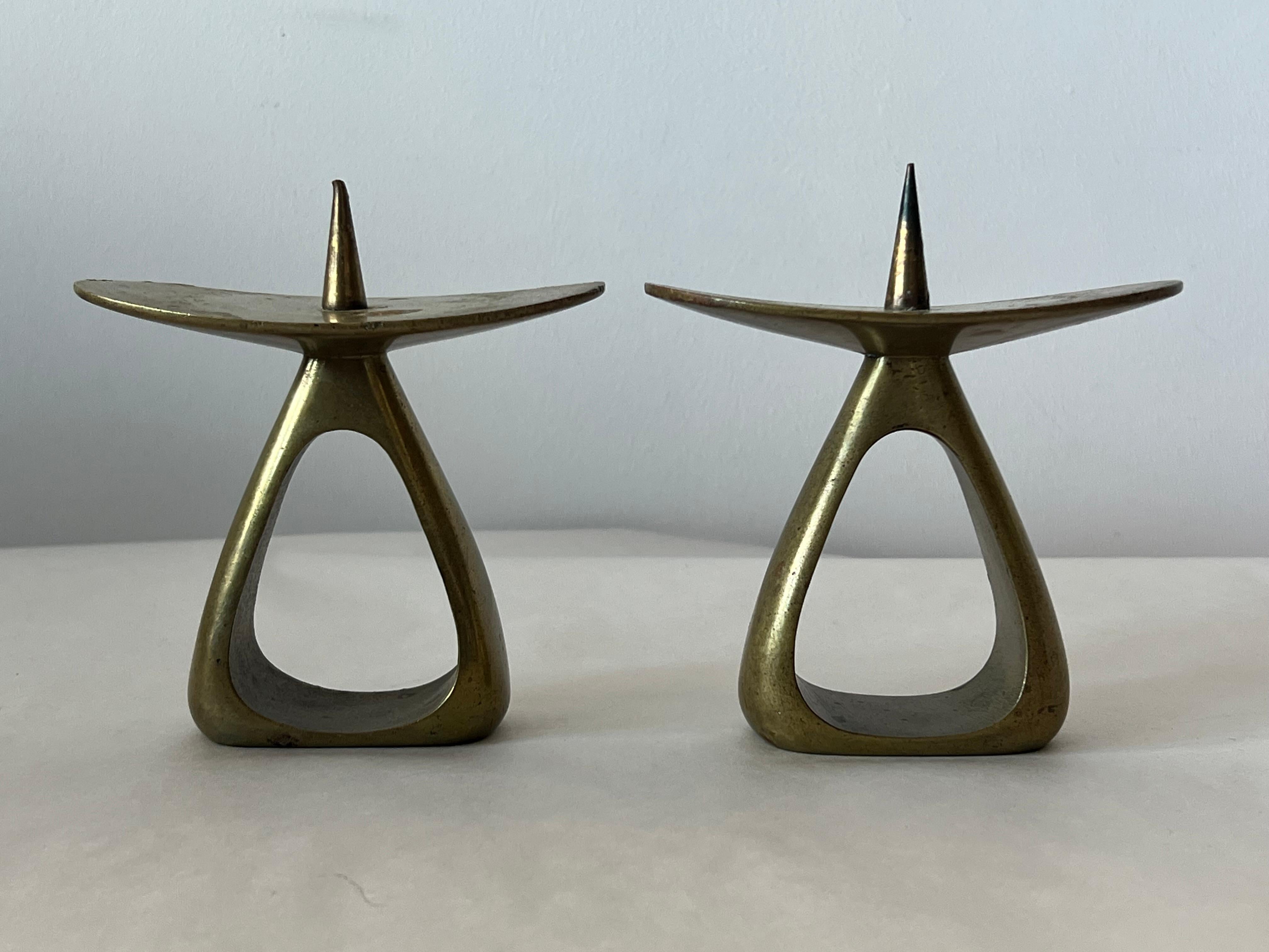 An unusual pair of brass candlesticks by Carl Aubock, Austria, ca' 1950's. Model 3600. A great modernist design that has been reissued-these are the original production. 