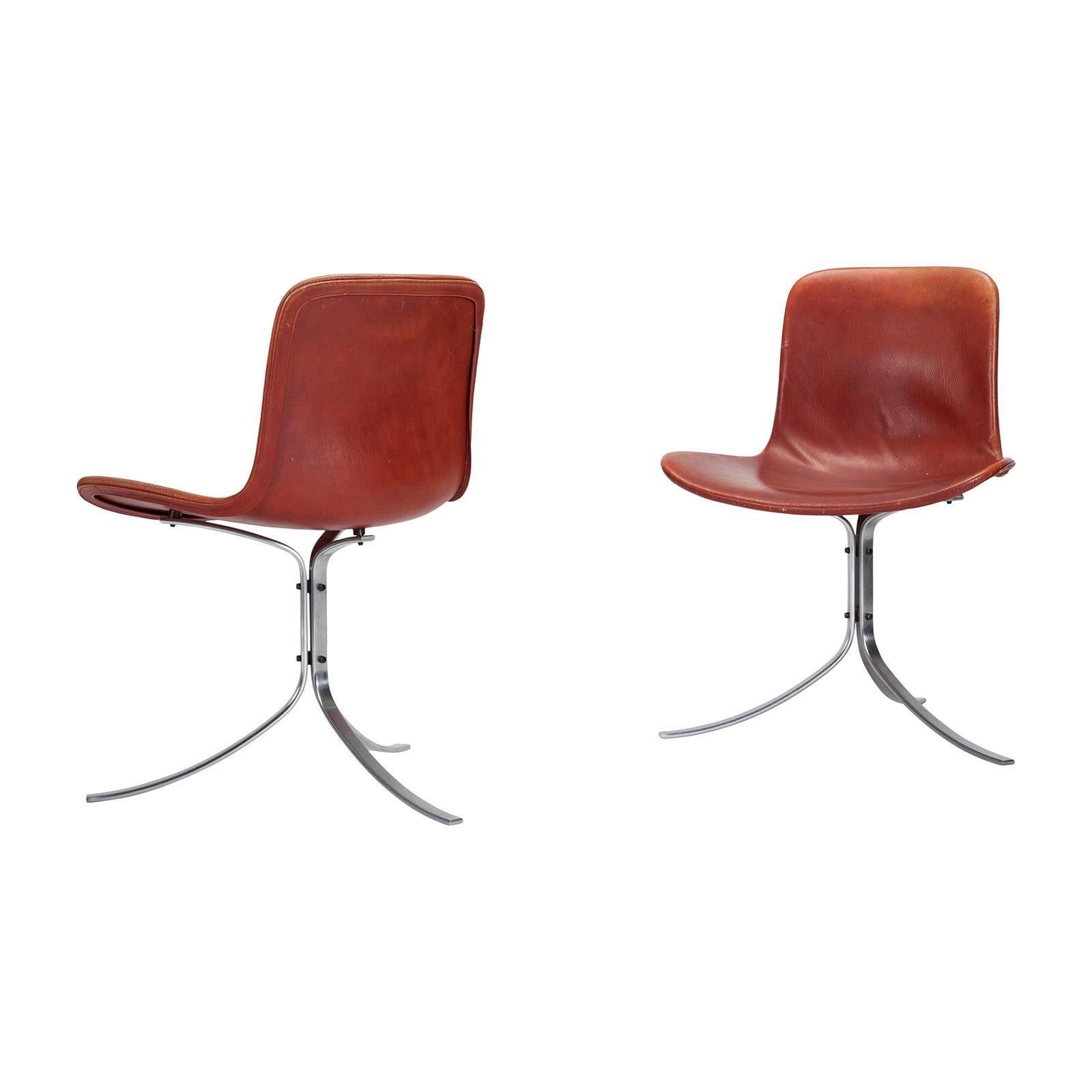 A pair of original PK 9 chairs designed by Poul Kjærholm in 1960 and manufactured by E. Kold Christensen, Denmark.
The chairs retain the original vegetable tanned reddish-brown leather which is in excellent condition and has beautiful patina. Bases