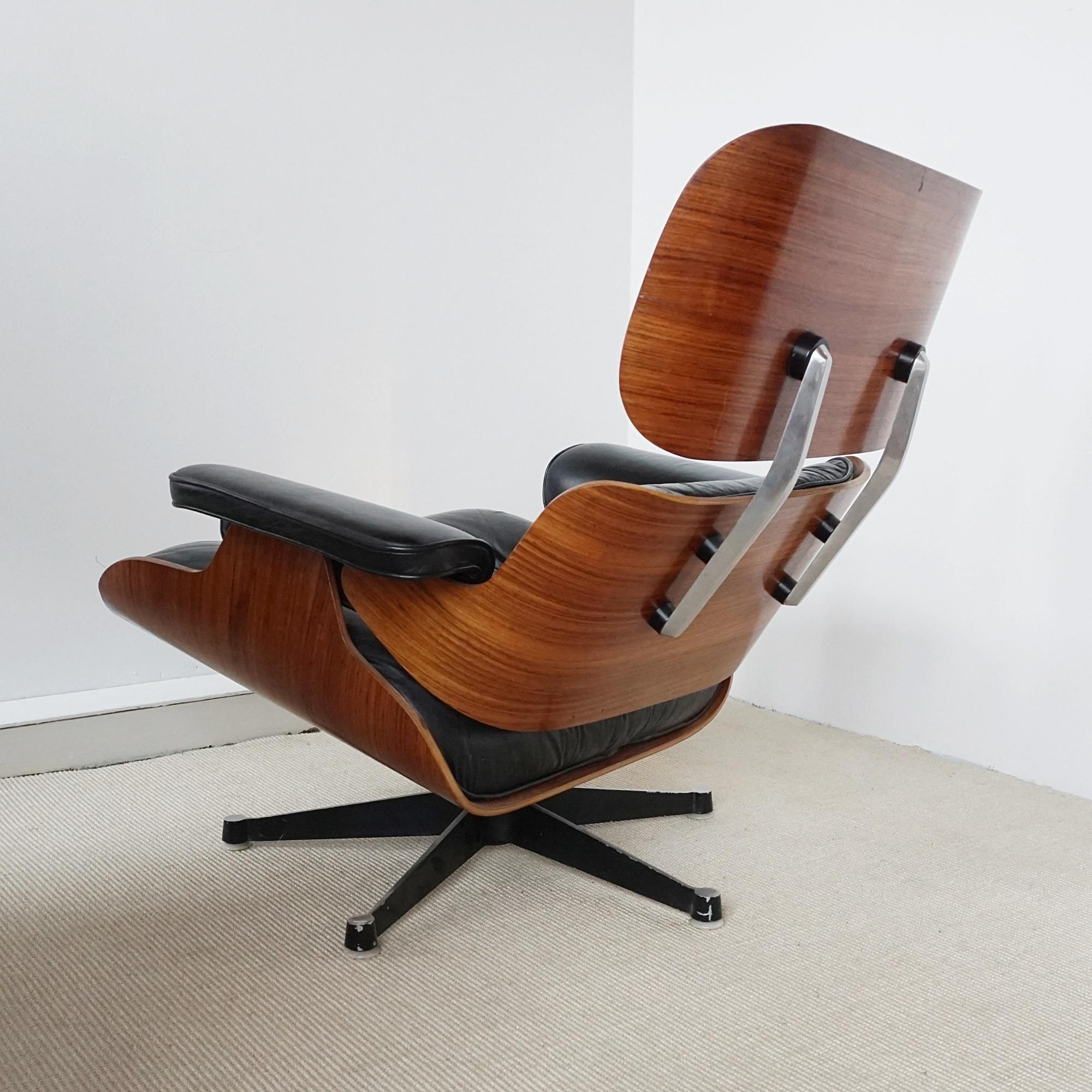A Pair of Original Herman Miller Eames Chairs and Ottoman for Hille 4