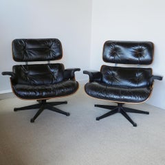 A Pair of Original Herman Miller Eames Chairs and Ottoman for Hille