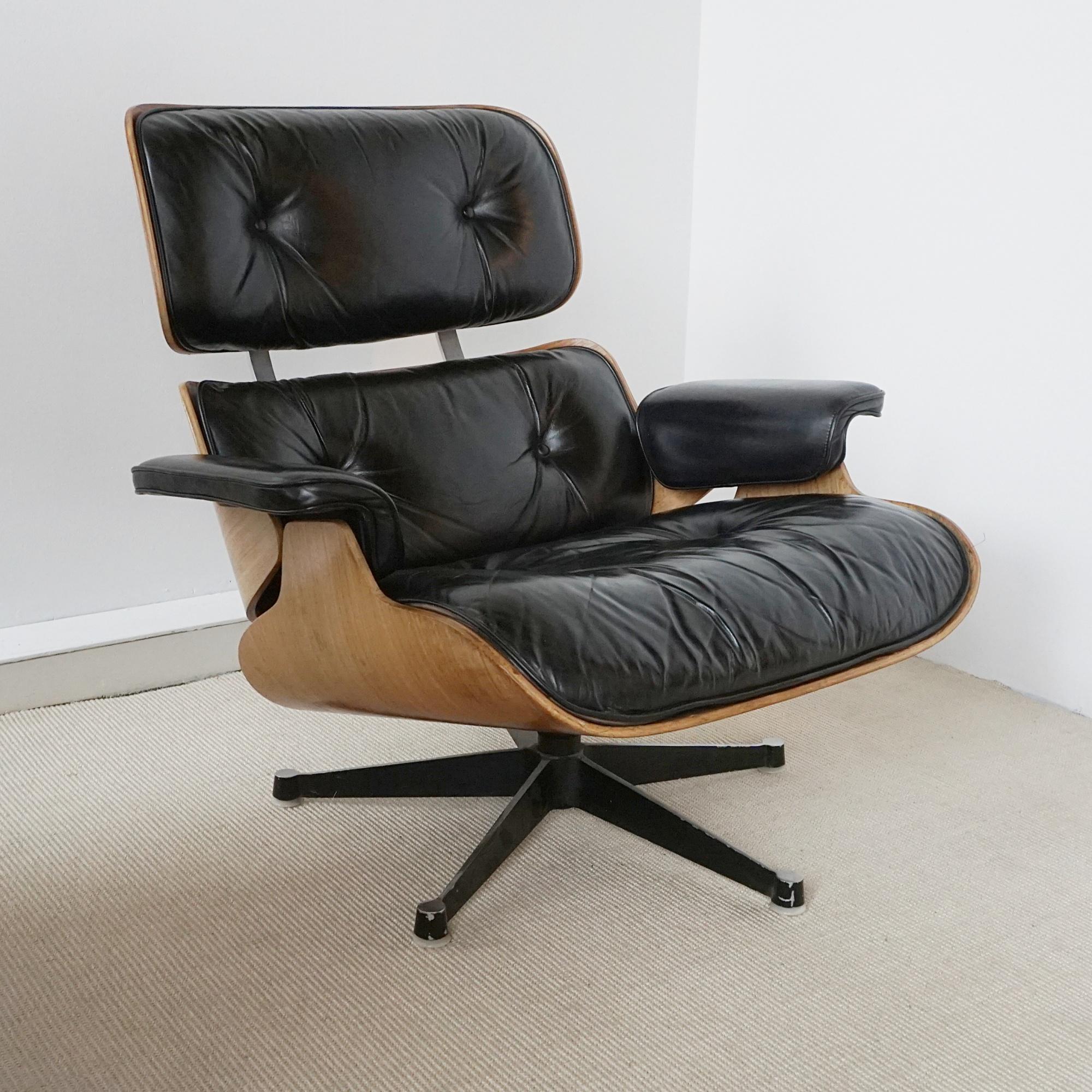 English A Pair of Original Herman Miller Eames Chairs and Ottoman for Hille
