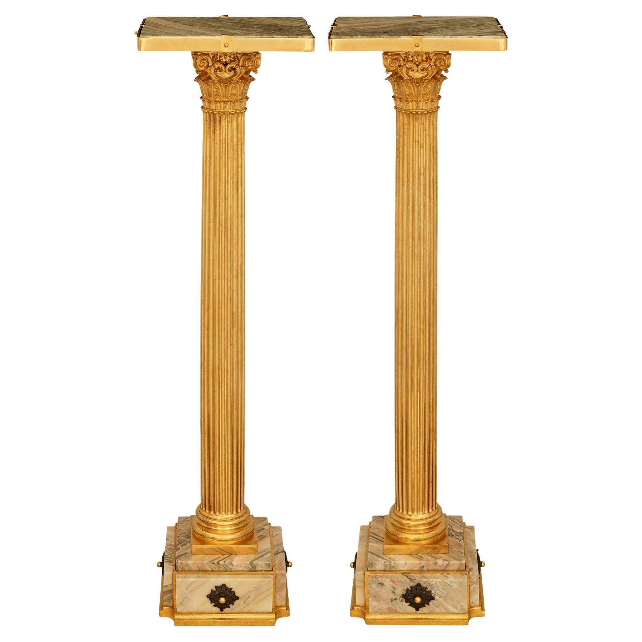 A pair of Ormolu, patinated Bronze and Rose Saint Pons Marble pedestals For Sale